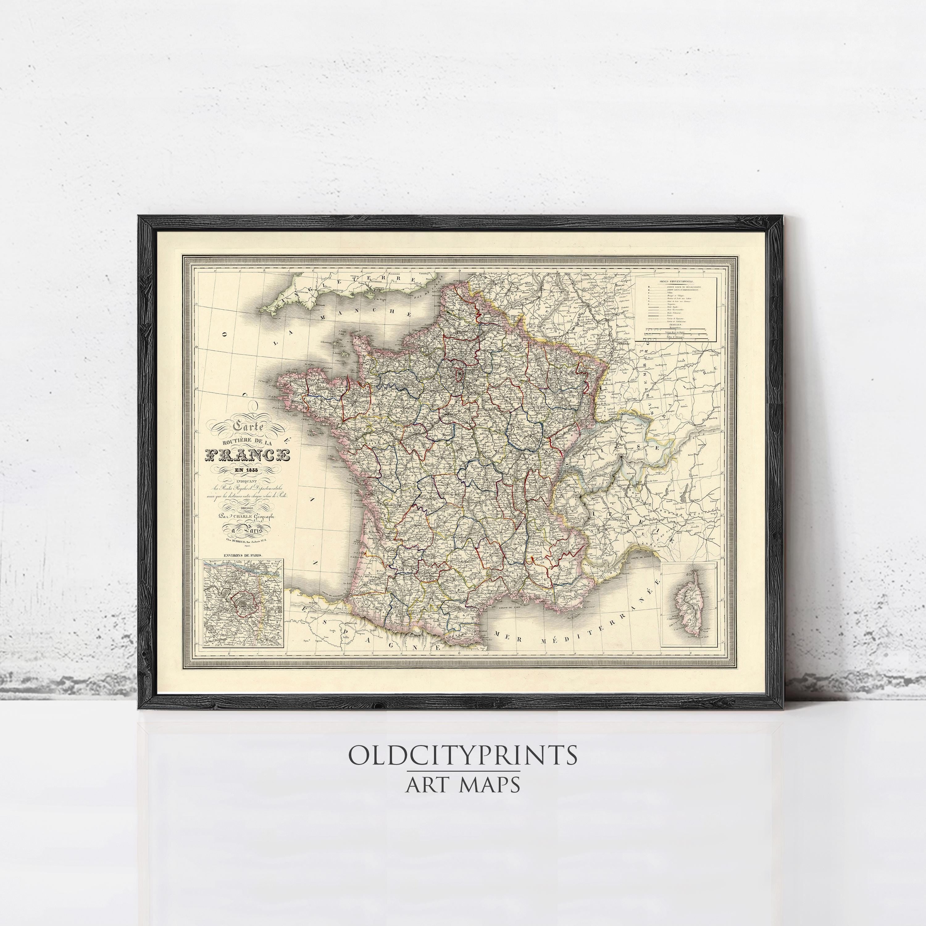 The image is a framed vintage map of France, depicting the country's roads and geographical layout.