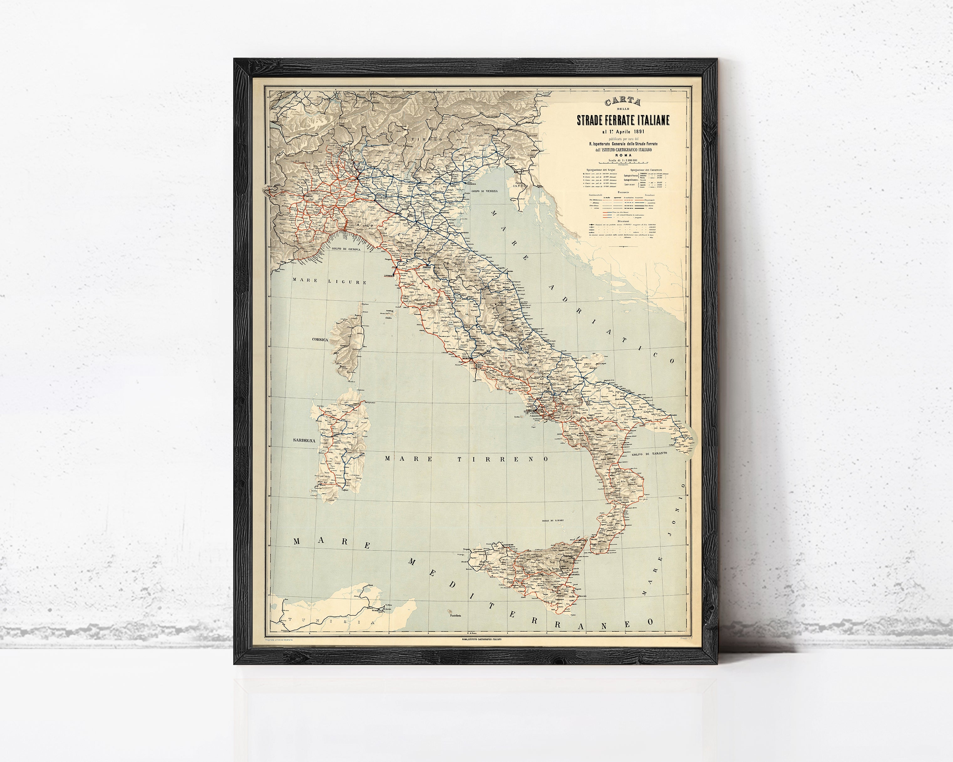 The image is a framed vintage map of Italy, showing the country's geographical layout and surrounding areas.