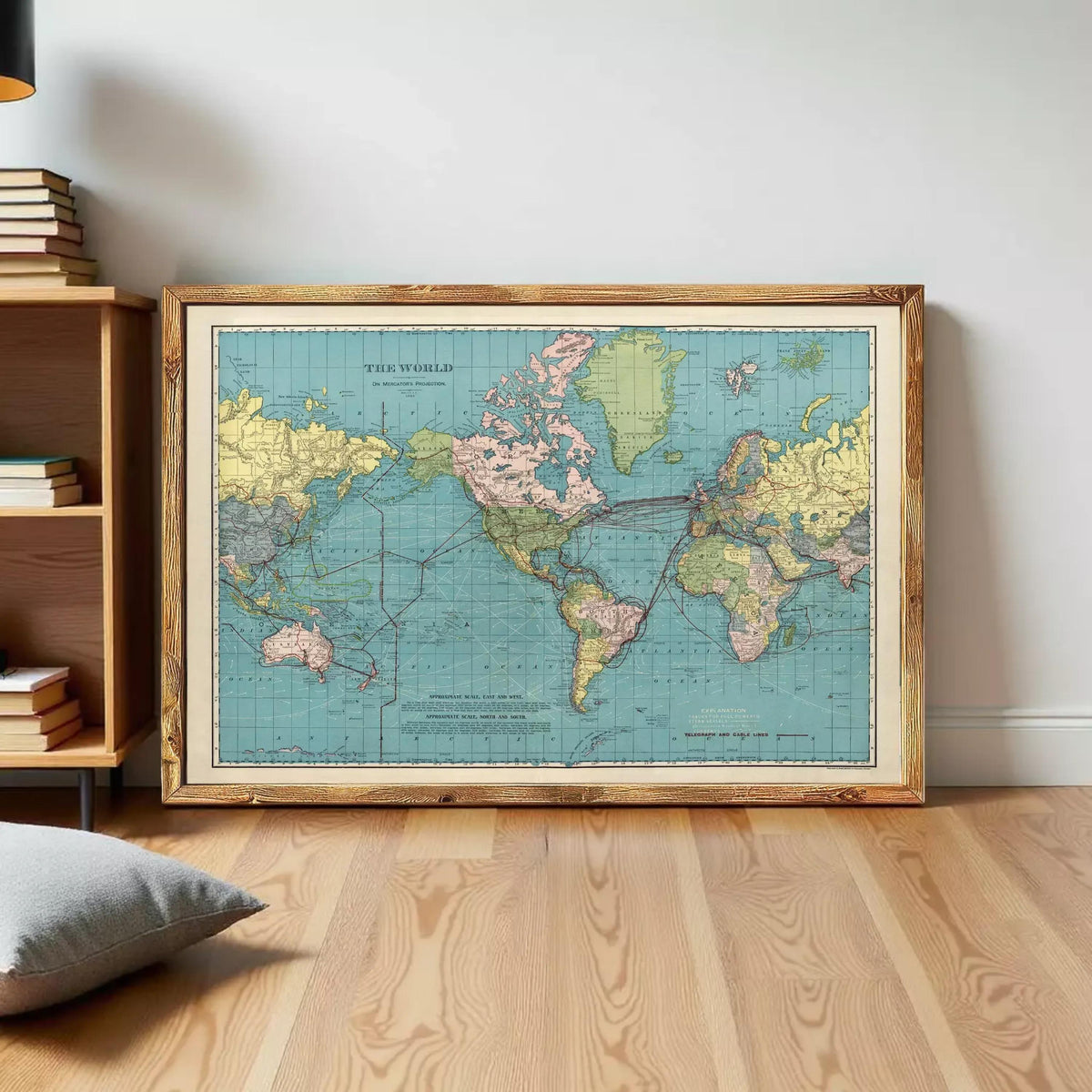 The image is a framed vintage map of the world, depicting the continents and oceans in a colorful and detailed manner.