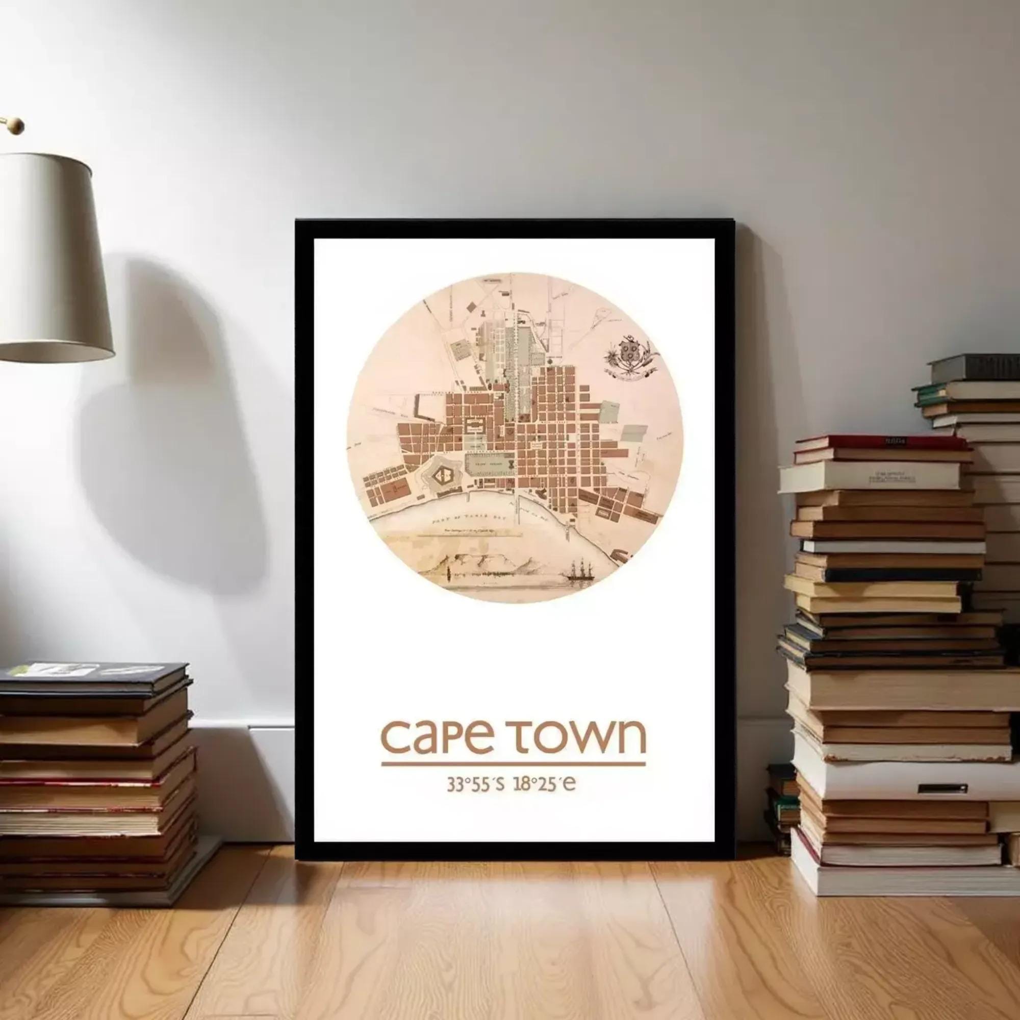 A framed map of Cape Town, South Africa, with the text "cape town" and the coordinates "35°35'S 28'25" e" below the map.