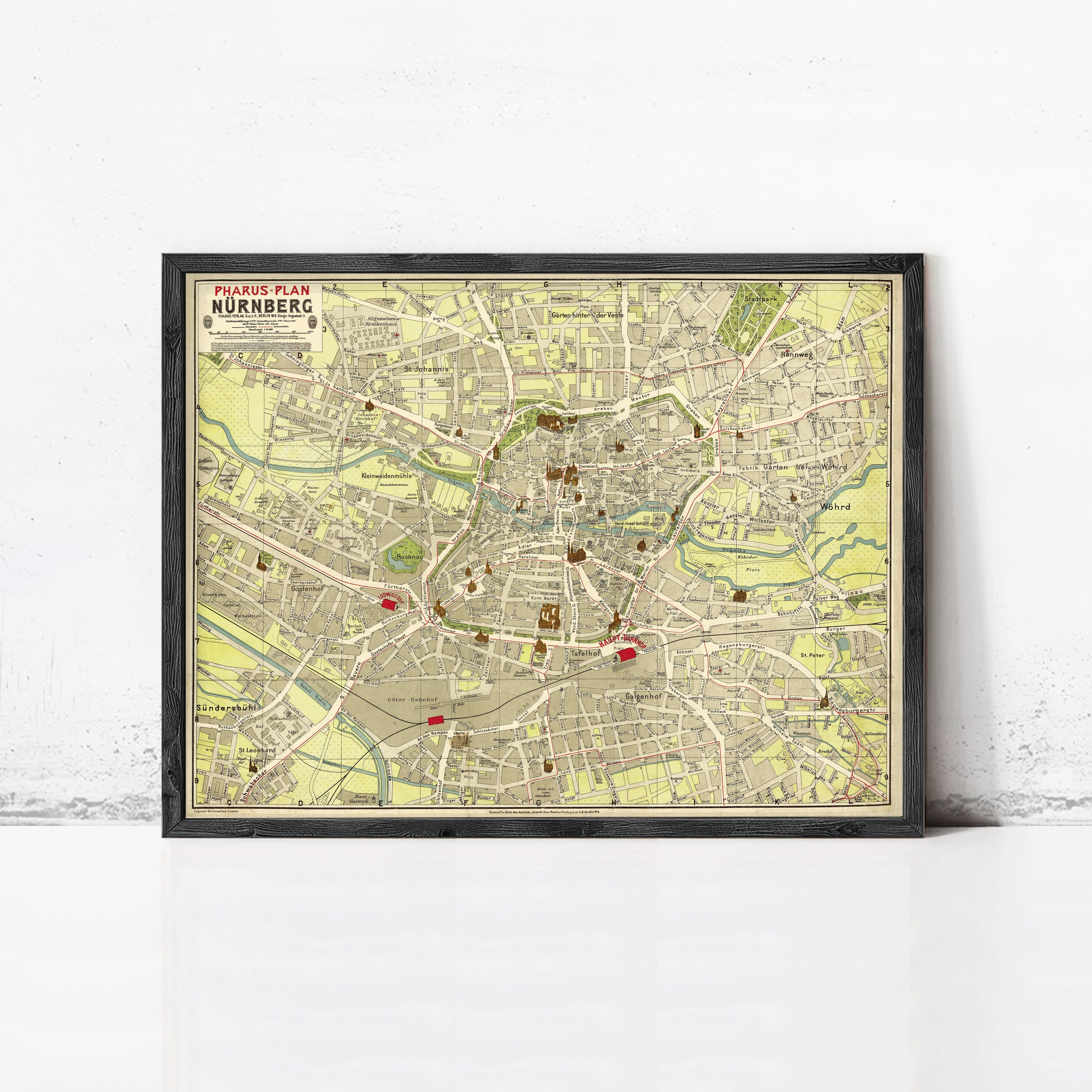 The image is a framed vintage map of Nuremberg, Germany, depicting the city's streets, landmarks, and surrounding areas.