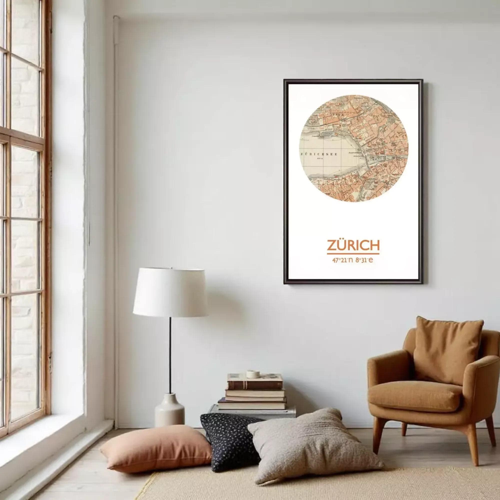a cozy living room with a large window, a lamp, a chair, and a framed map of Zurich.