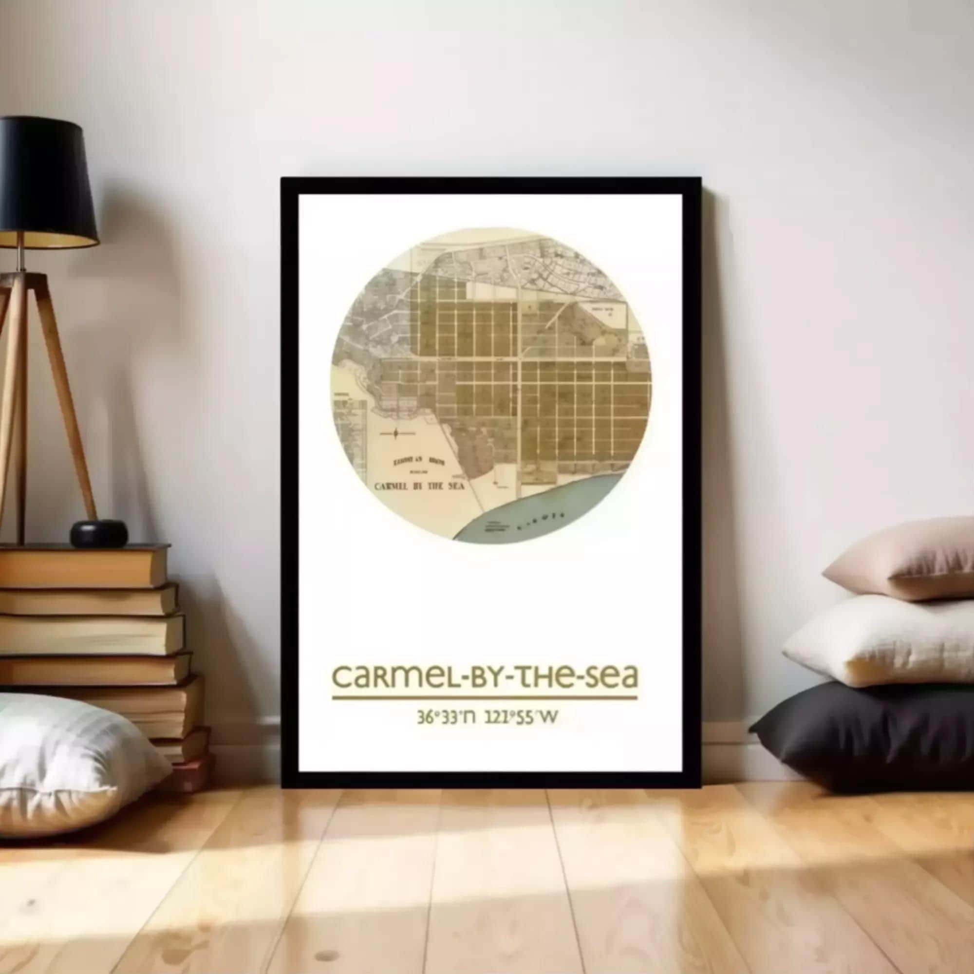 A framed map of Carmel-by-the-Sea, California, with the text "Carmel-by-the-Sea" and the coordinates "36°37'31" N 122°55'W" below the map.