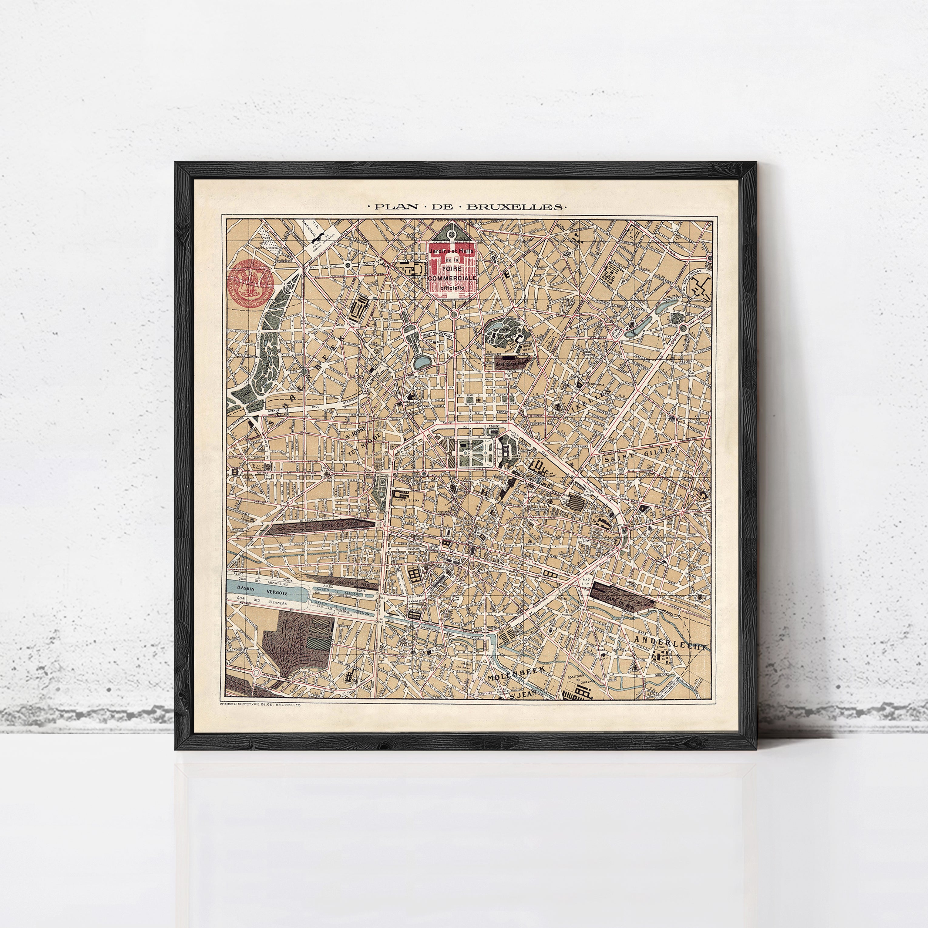 The image is a framed vintage map of Brussels, Belgium, depicting the city's streets and landmarks.