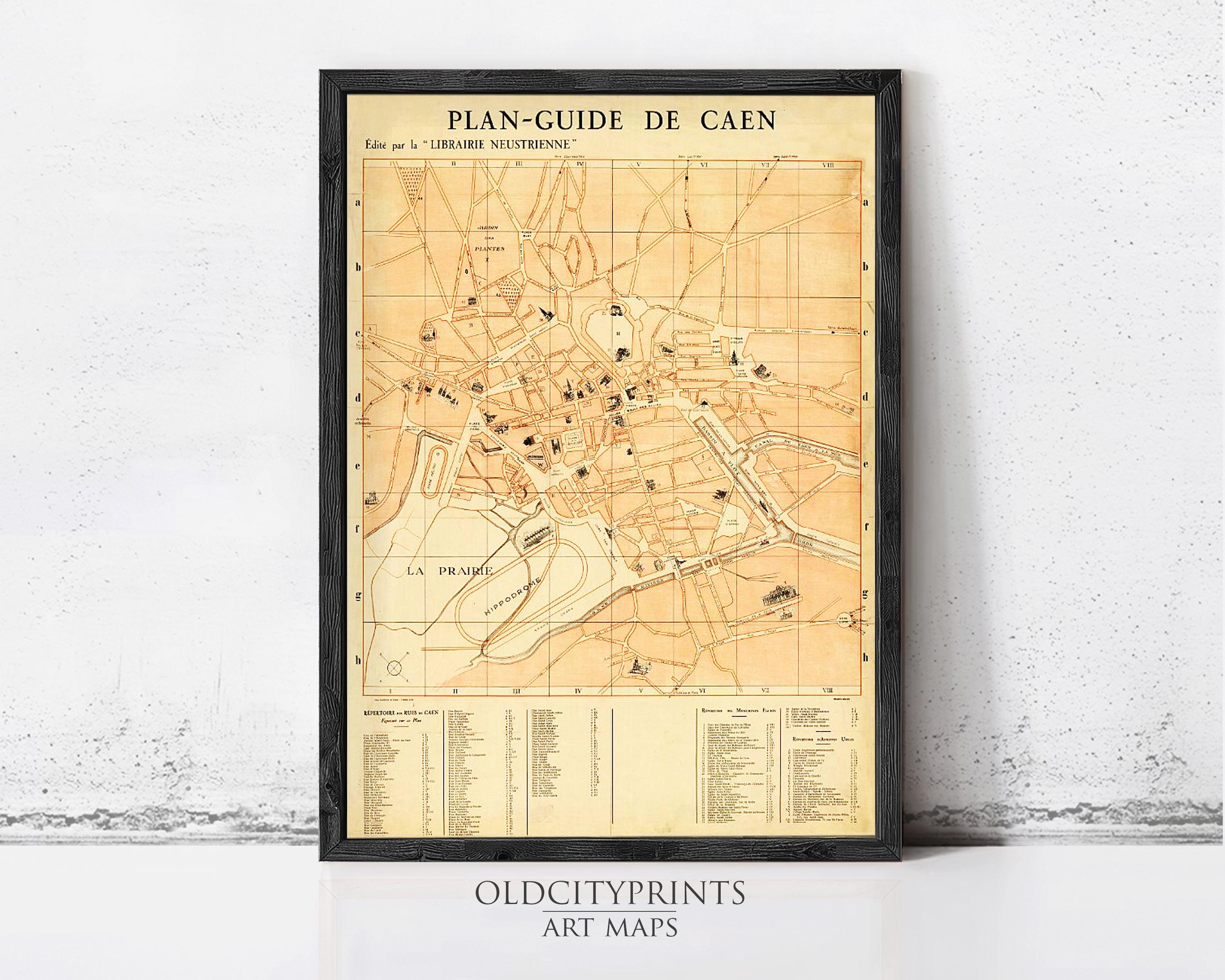 The image is a framed vintage map of Caen, France, depicting the city's layout and surrounding areas.