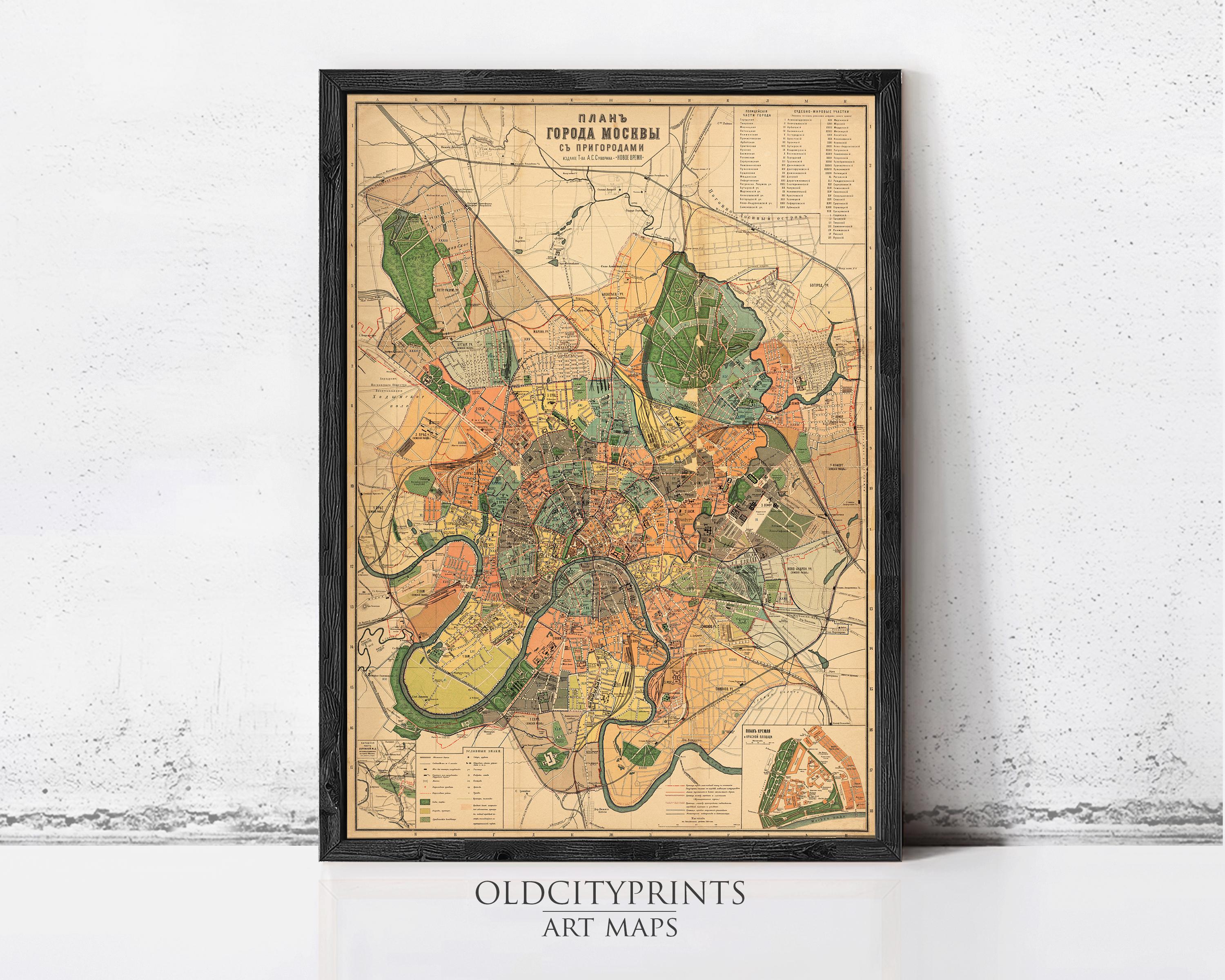 The image is a framed vintage map of a city, likely Moscow, with various landmarks and streets depicted.