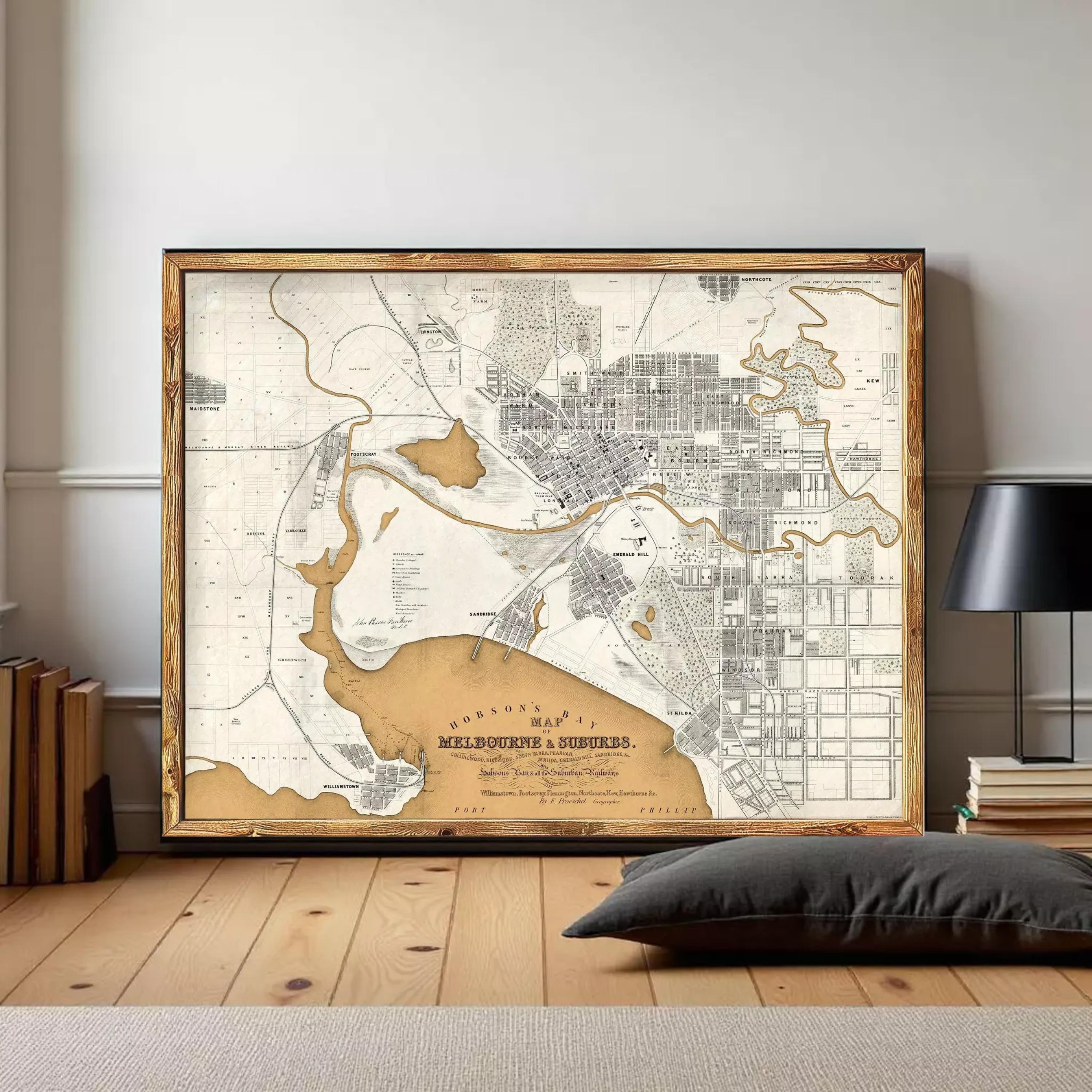 The image is a framed vintage map of Melbourne, Australia, depicting the city's layout and surrounding areas.
