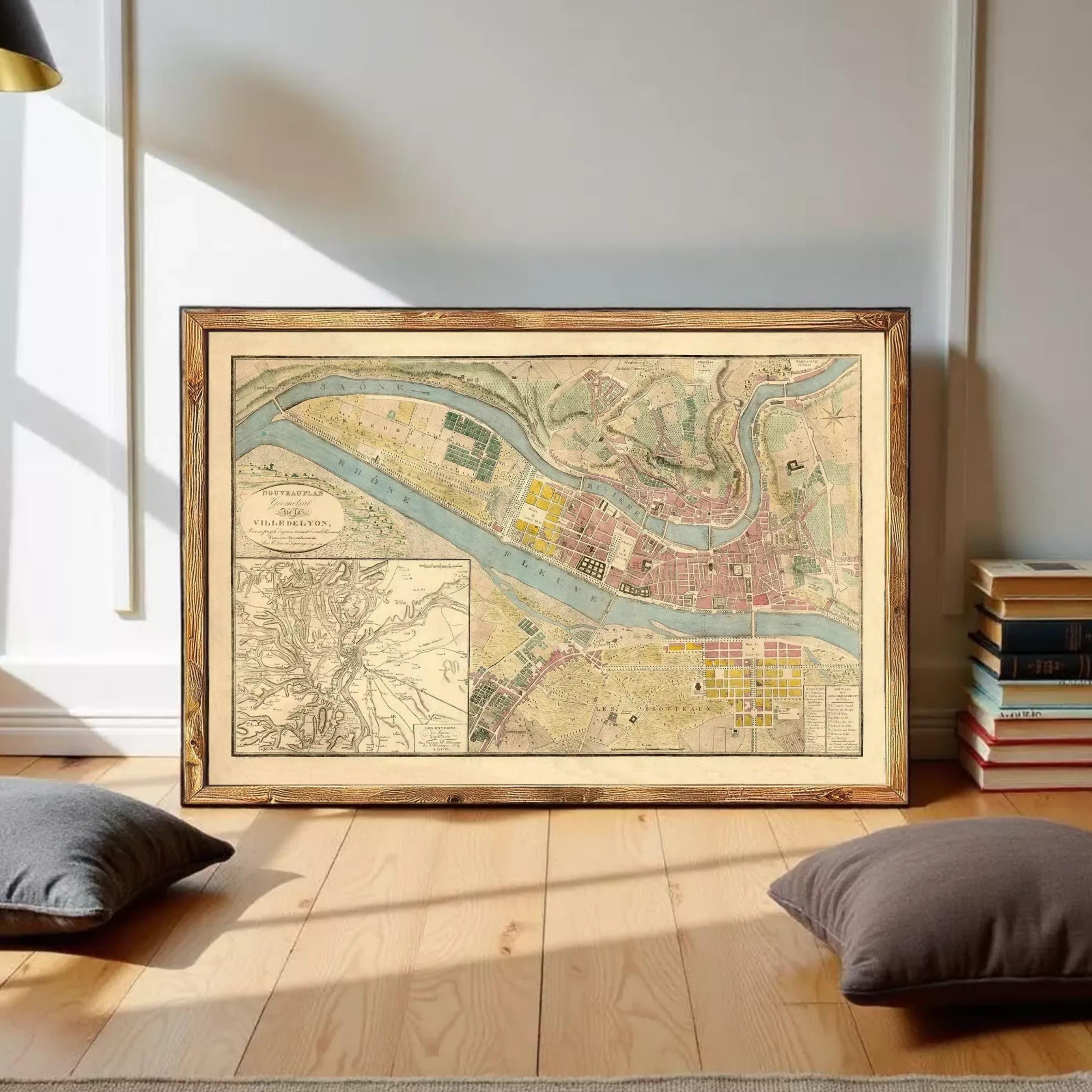 The image is a framed antique map of a city, likely from the 19th century, depicting a detailed layout of the city's streets, buildings, and surrounding areas.