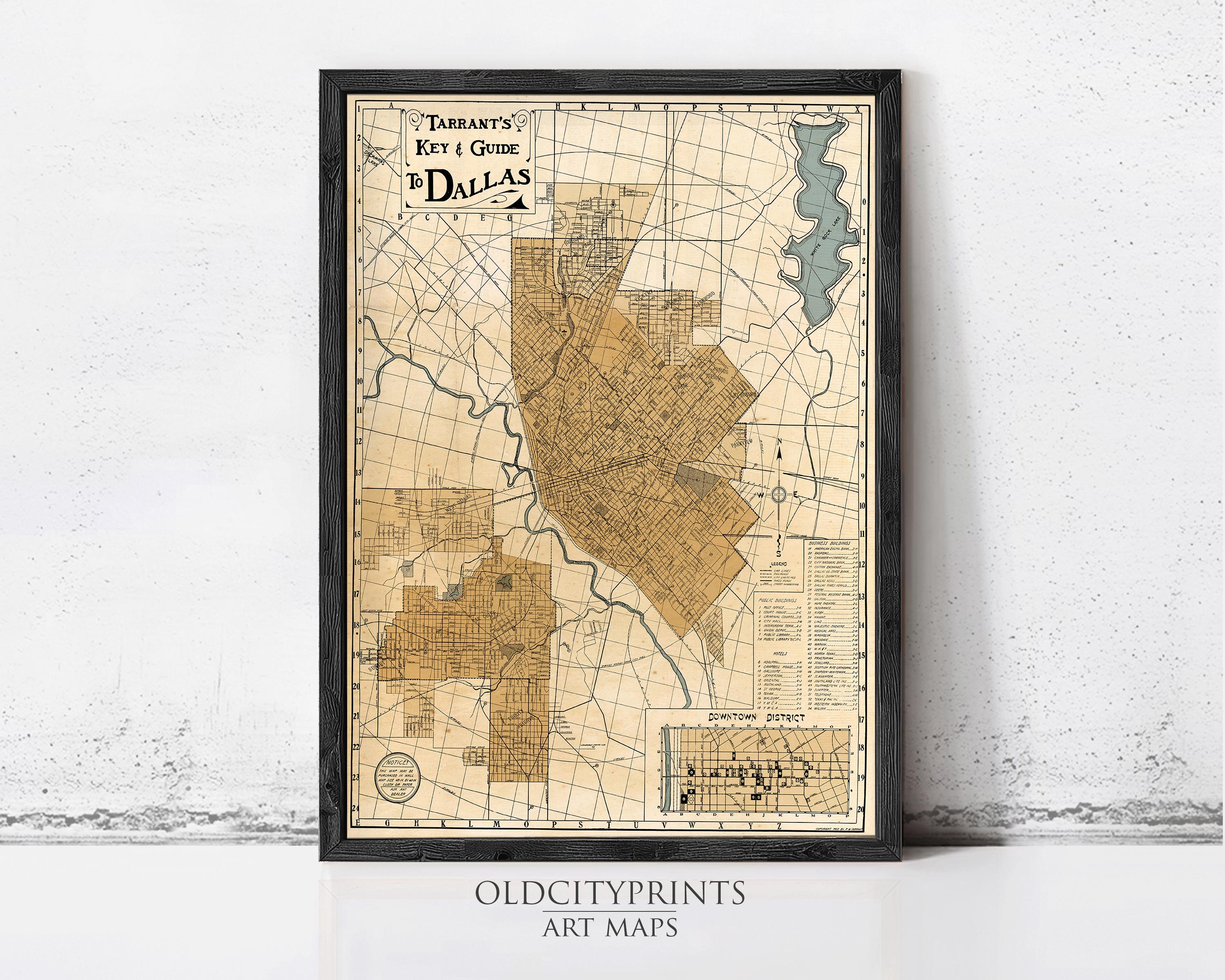The image is a framed vintage map of Dallas, Texas, depicting the city's layout and surrounding areas.