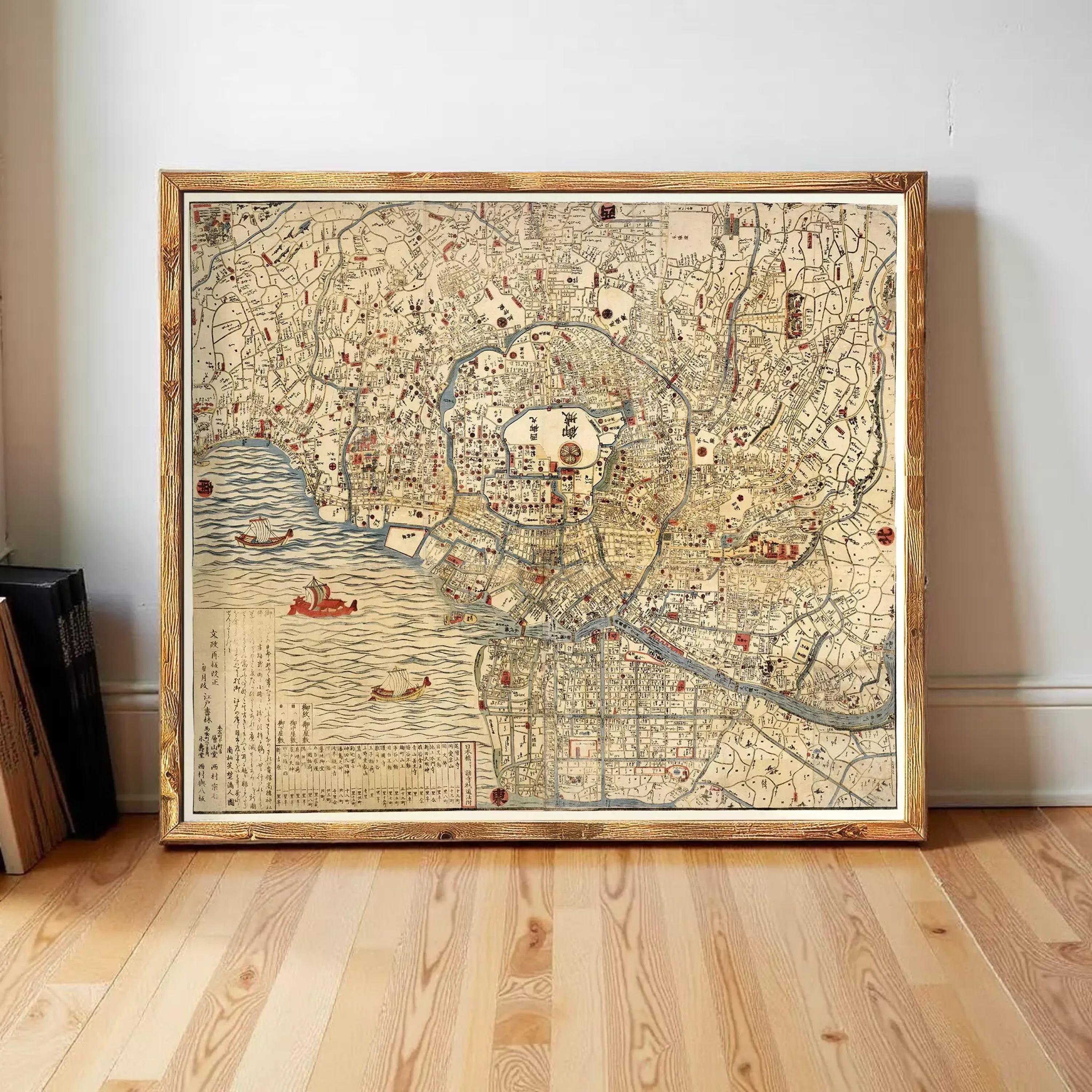 The image is a framed antique map of Tokyo, Japan, depicting the city's layout and surrounding areas.