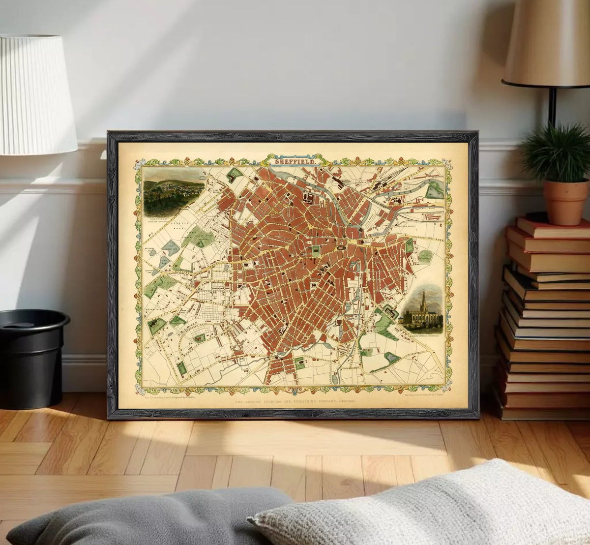 The image is a framed vintage map of a city, likely Paris, with a detailed and colorful depiction of the city's streets and landmarks.