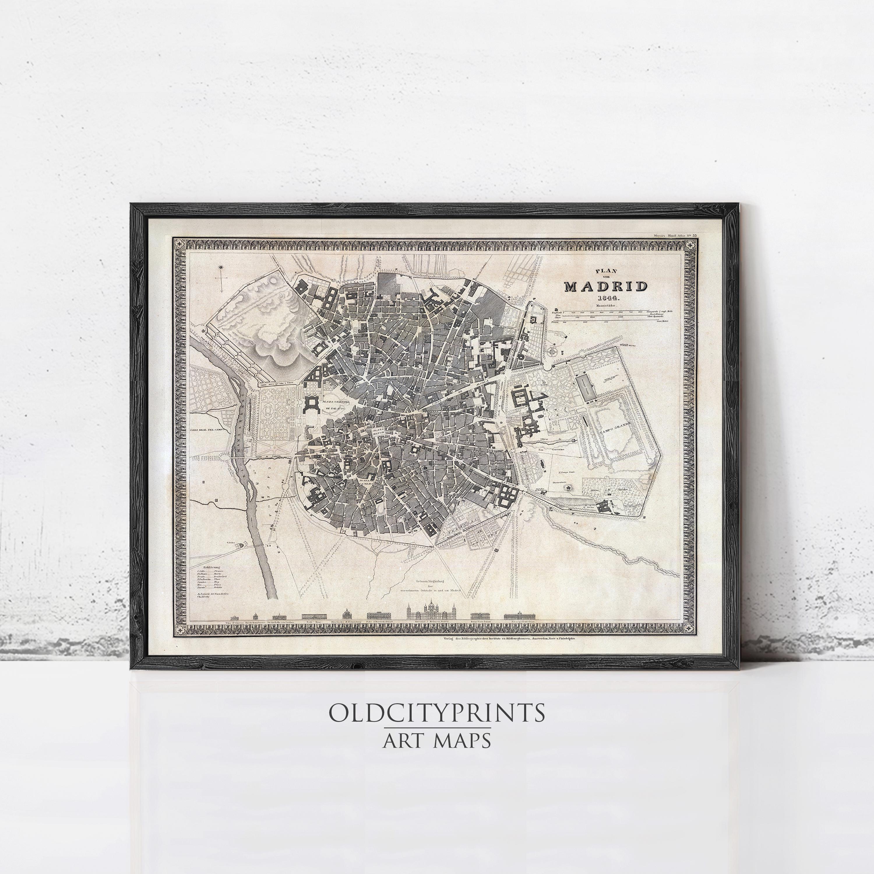 The image is a framed vintage map of Madrid, Spain, depicting the city's layout and surrounding areas.