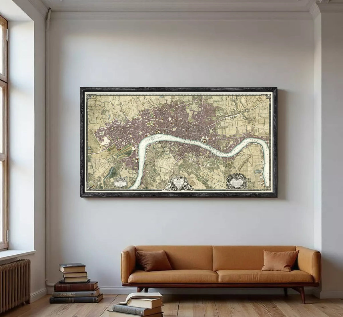 A framed map of London, England, with a river running through the city.