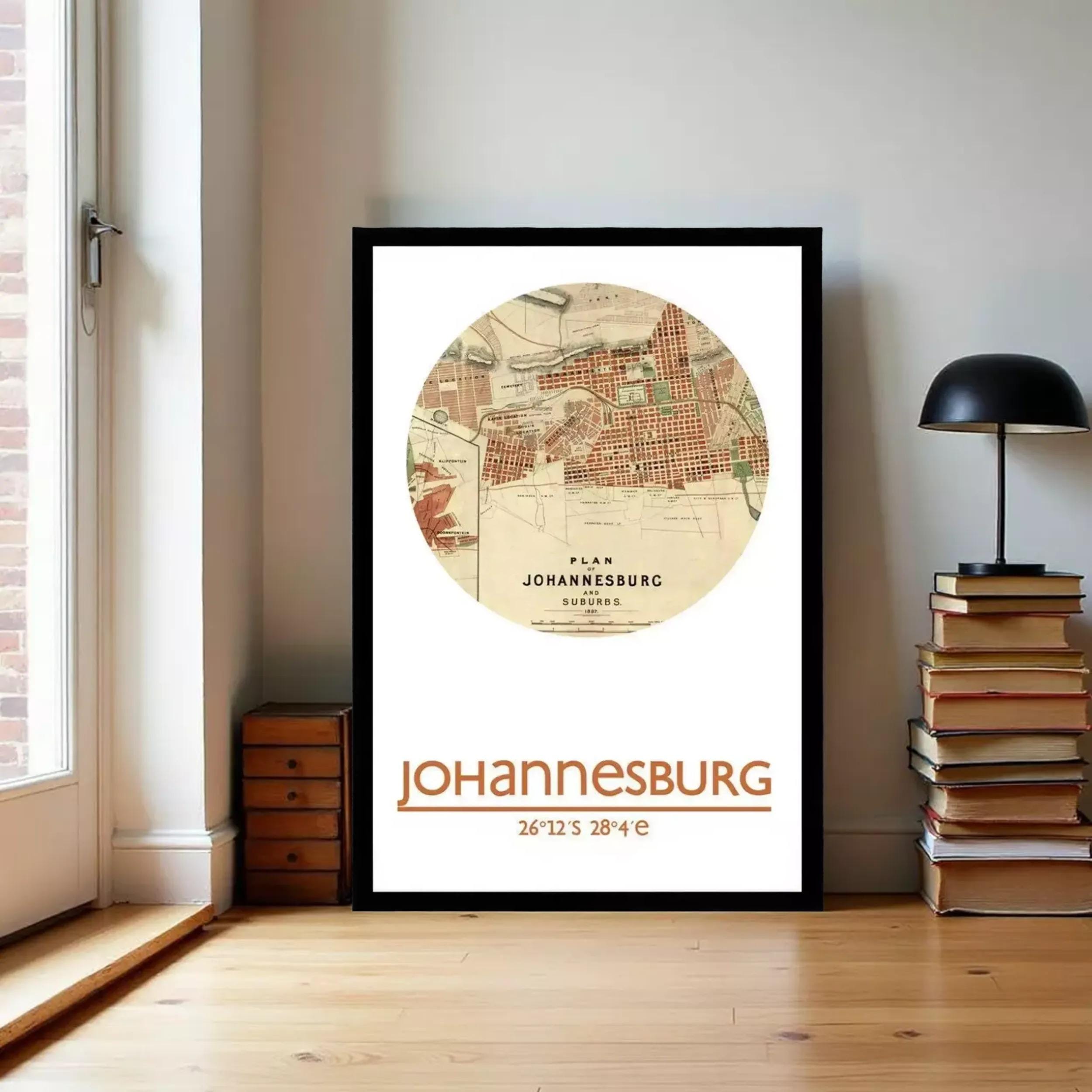 A framed map of Johannesburg, South Africa, with the text "Plan Johannesburg" and "26.12.28.4°" printed on it.