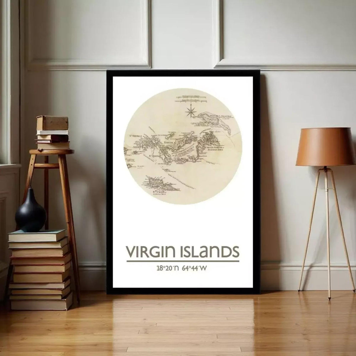 a framed map of the Virgin Islands, with a wooden stool and a lamp to the side.
