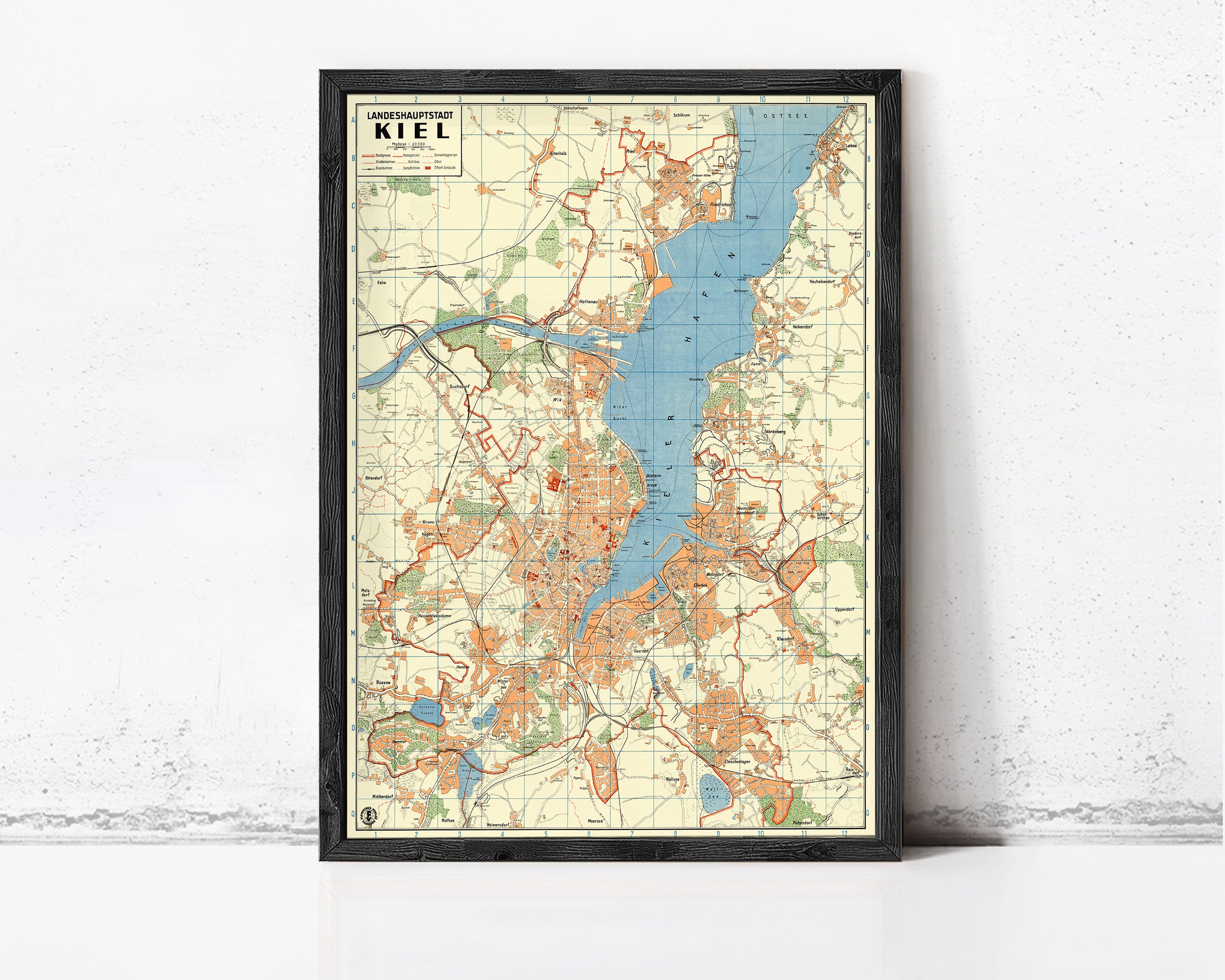 The image is a framed map of the city of Kiel, Germany, showing various landmarks and geographical features.