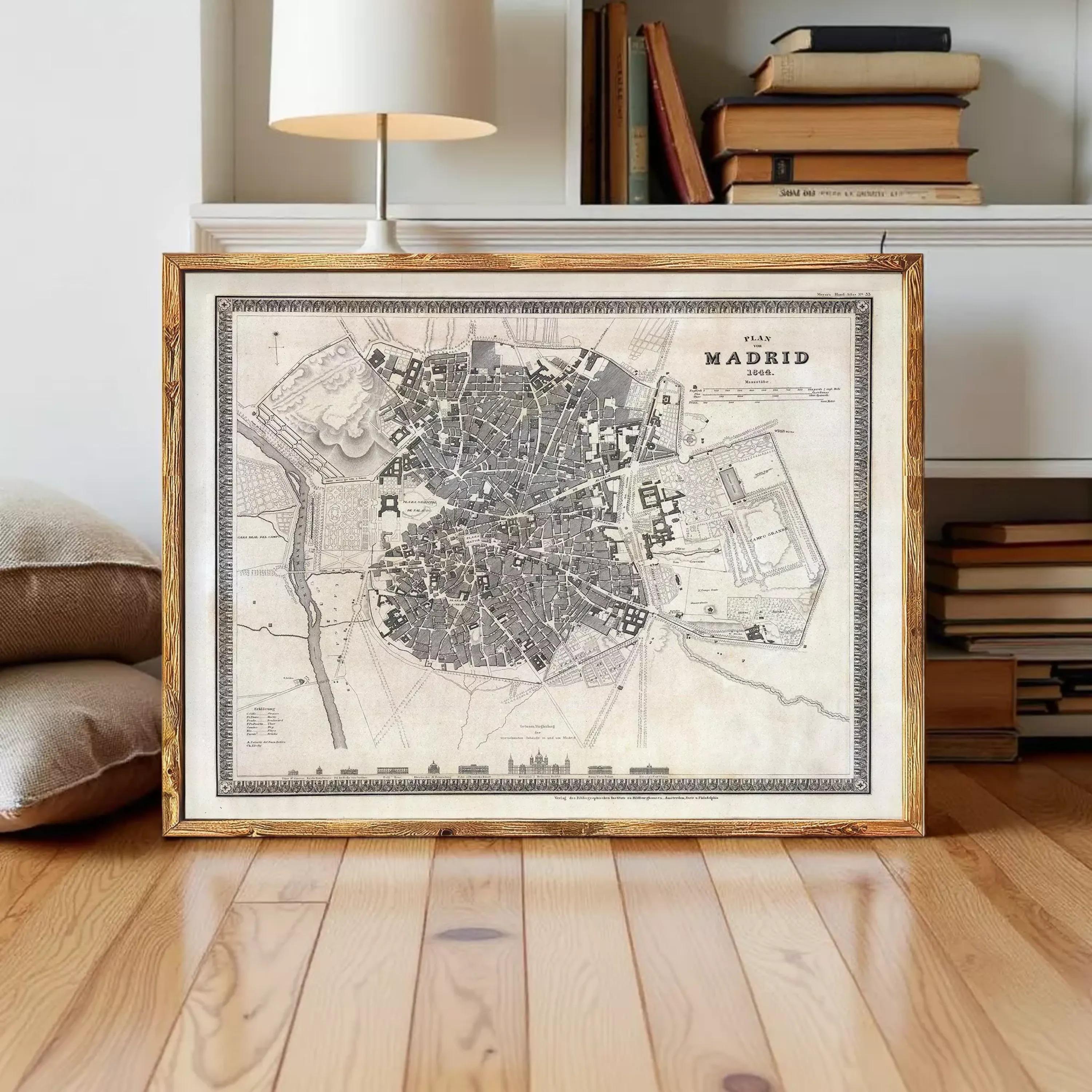 The image is a framed historical map of Madrid, Spain, depicting the city's layout and surrounding areas.