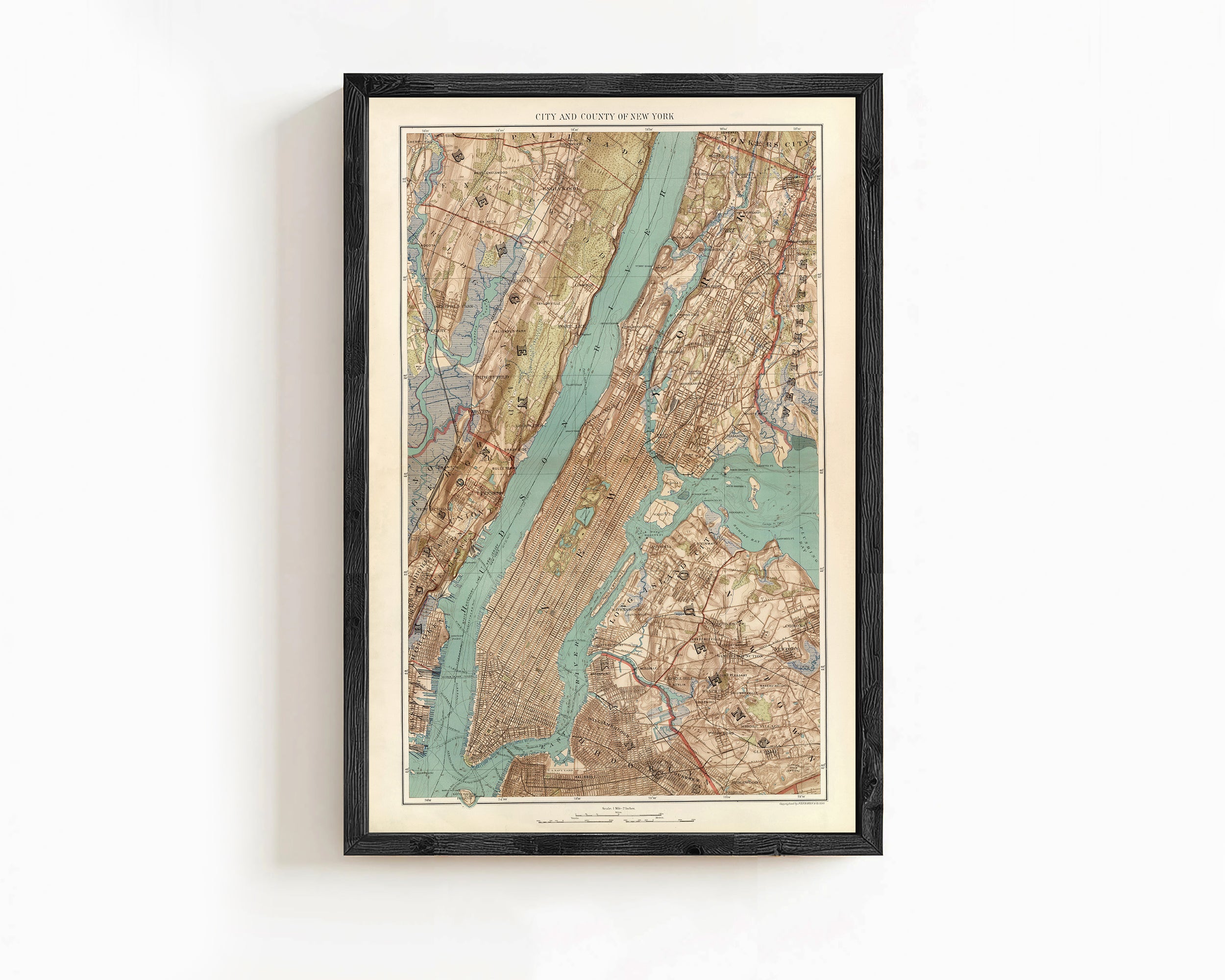 The image is a framed vintage map of New York City, depicting the city's streets, waterways, and surrounding areas.
