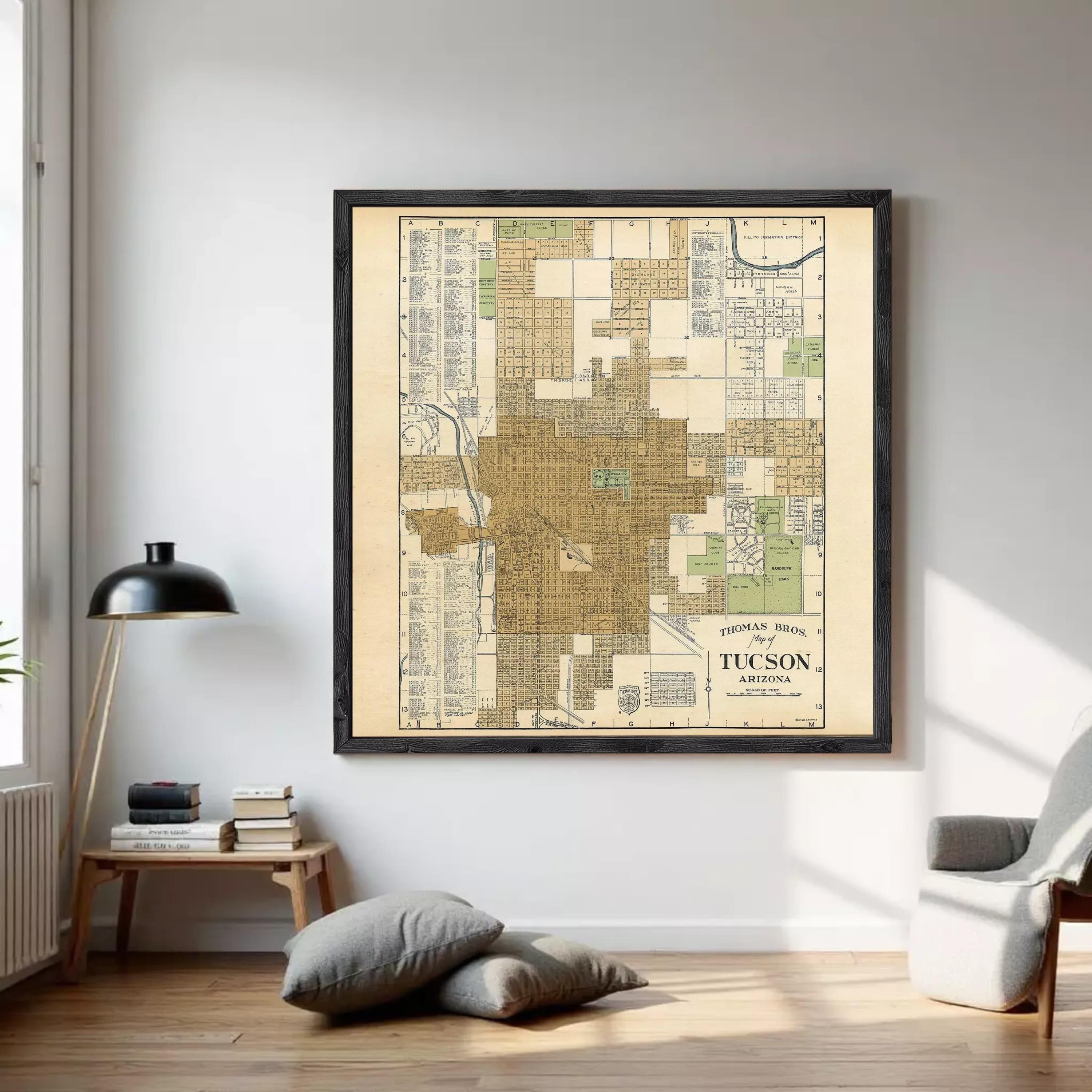 The image is a framed vintage map of Tucson, Arizona, depicting the city's layout and surrounding areas.