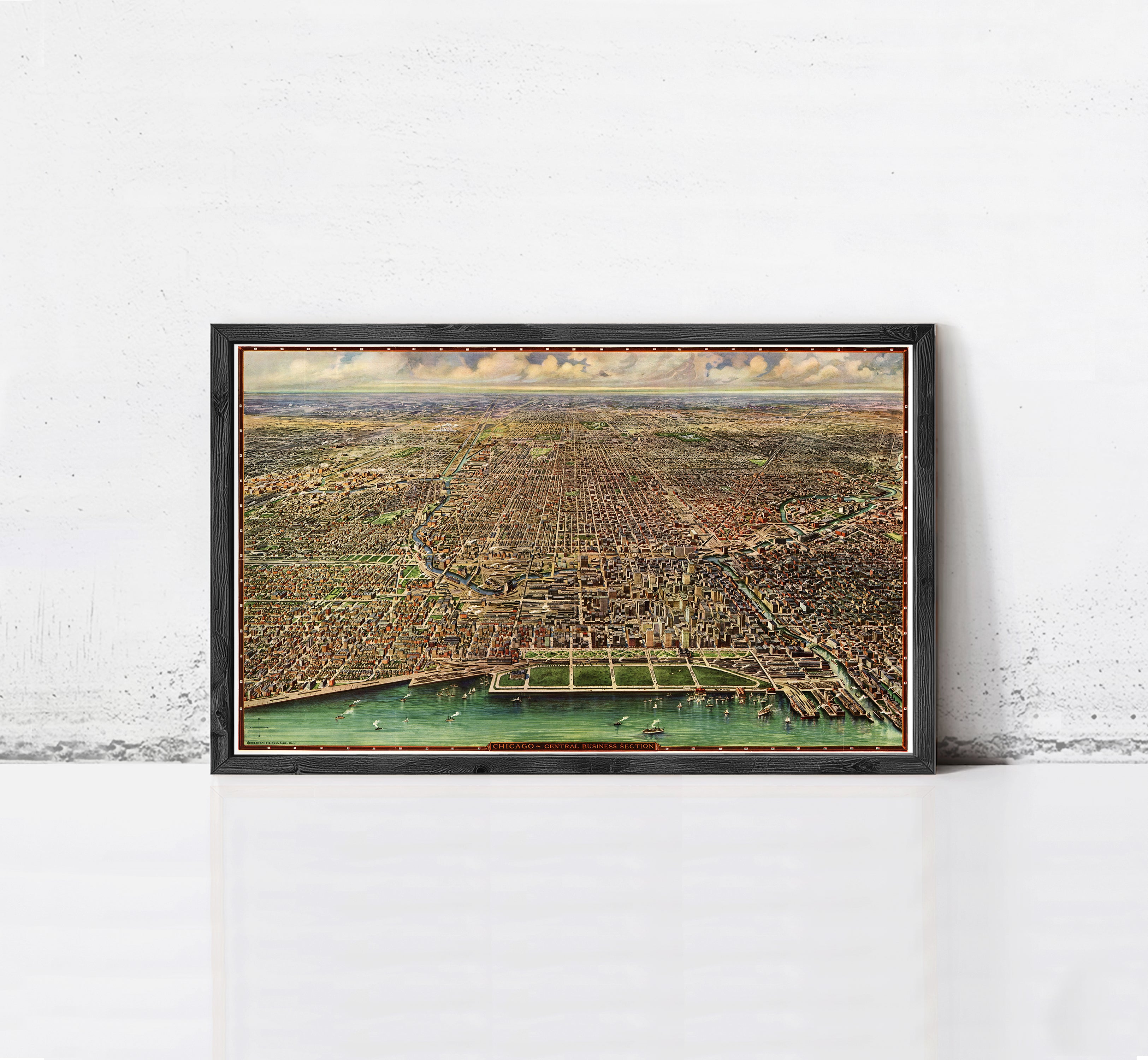 The image is a framed painting depicting a cityscape with a river running through it.