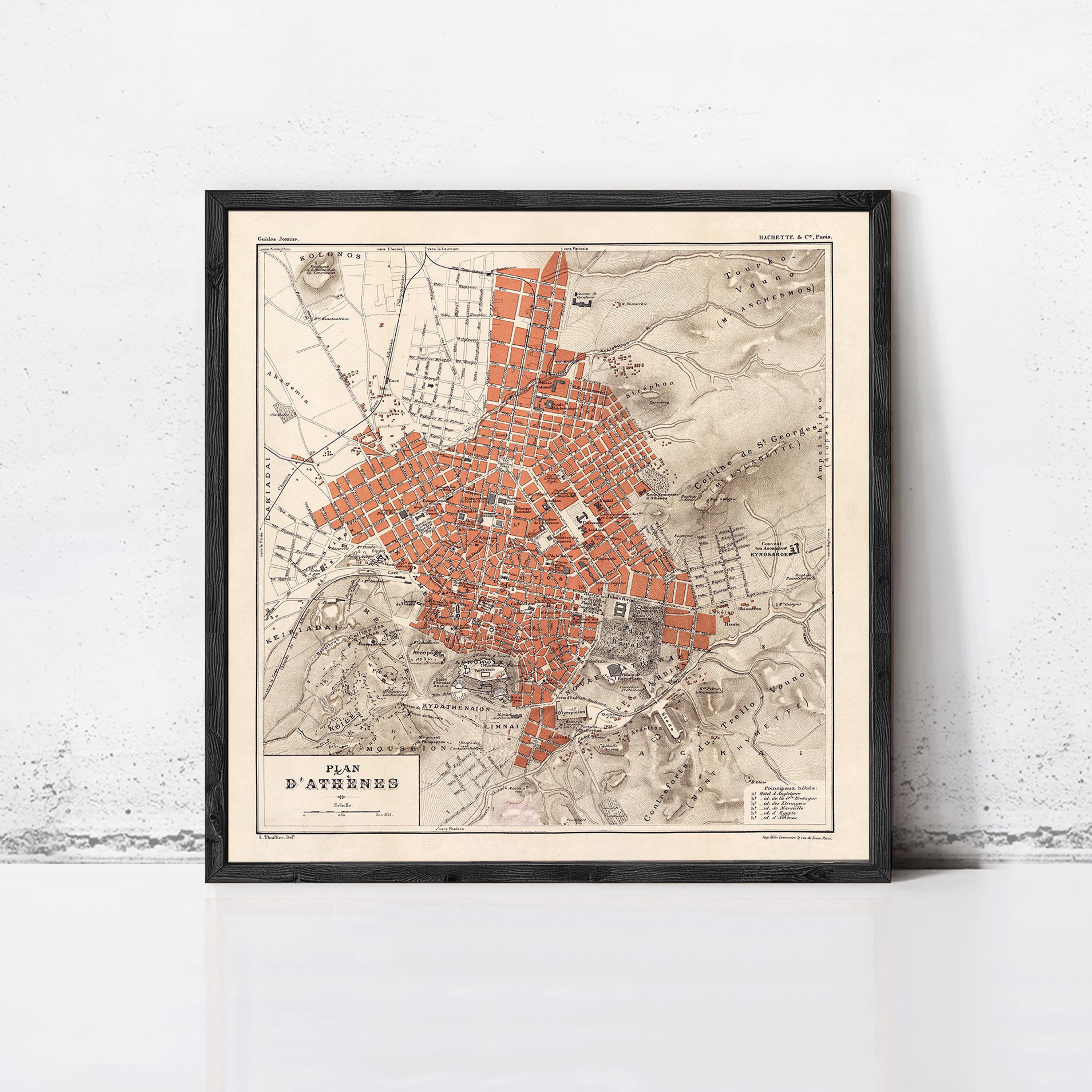 The image is a framed vintage map of the city of Athens, Greece, depicting the city's streets and landmarks in a detailed and colorful manner.