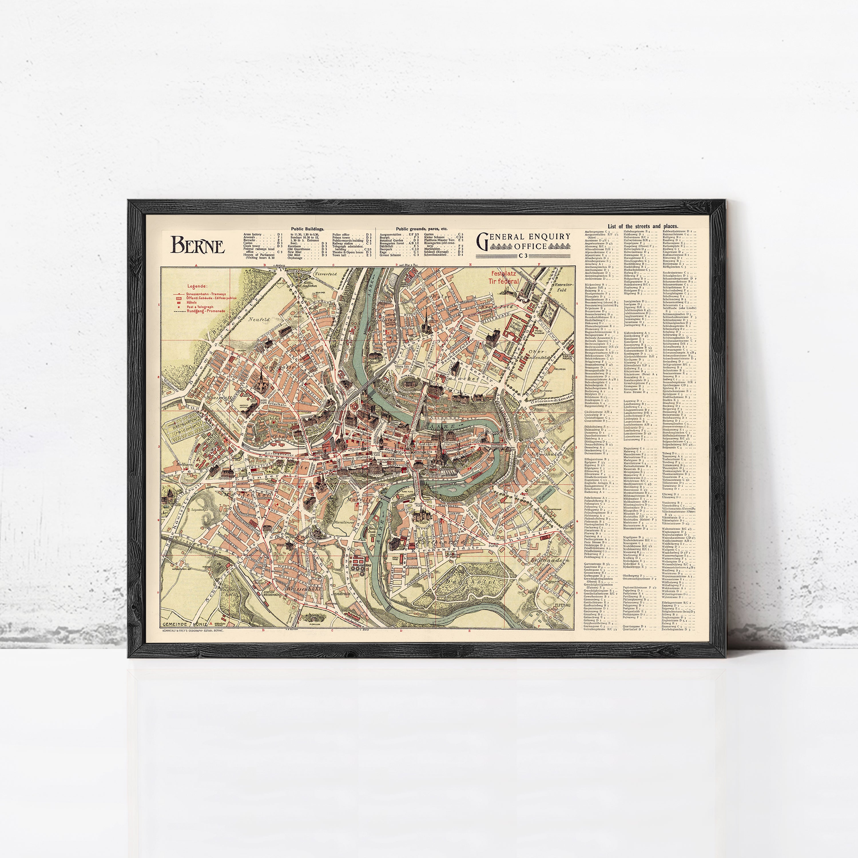 The image is a framed map of the city of Bern, Switzerland, showing the layout of the streets, buildings, and other landmarks.