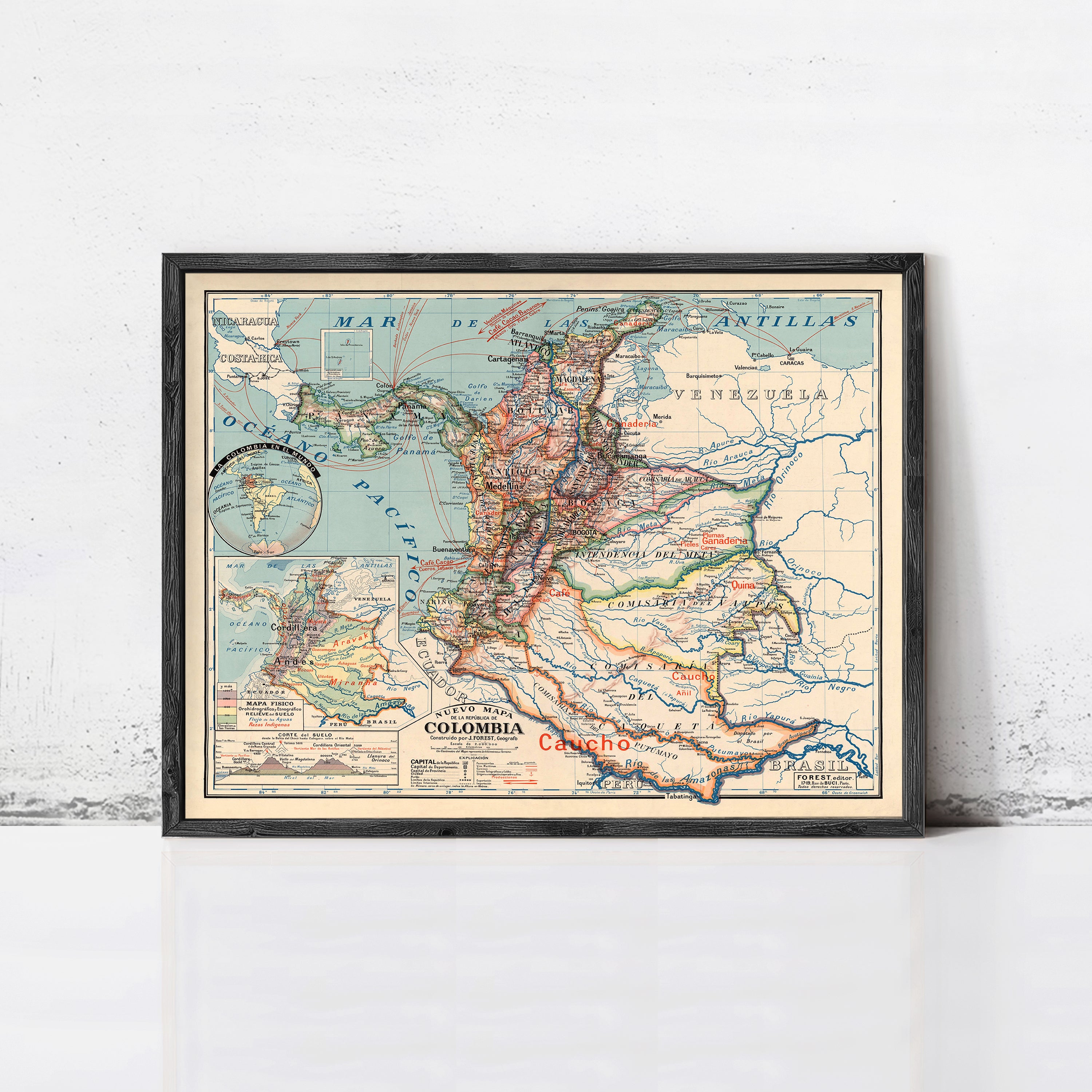 The image is a framed vintage map of South America, specifically focusing on Colombia.