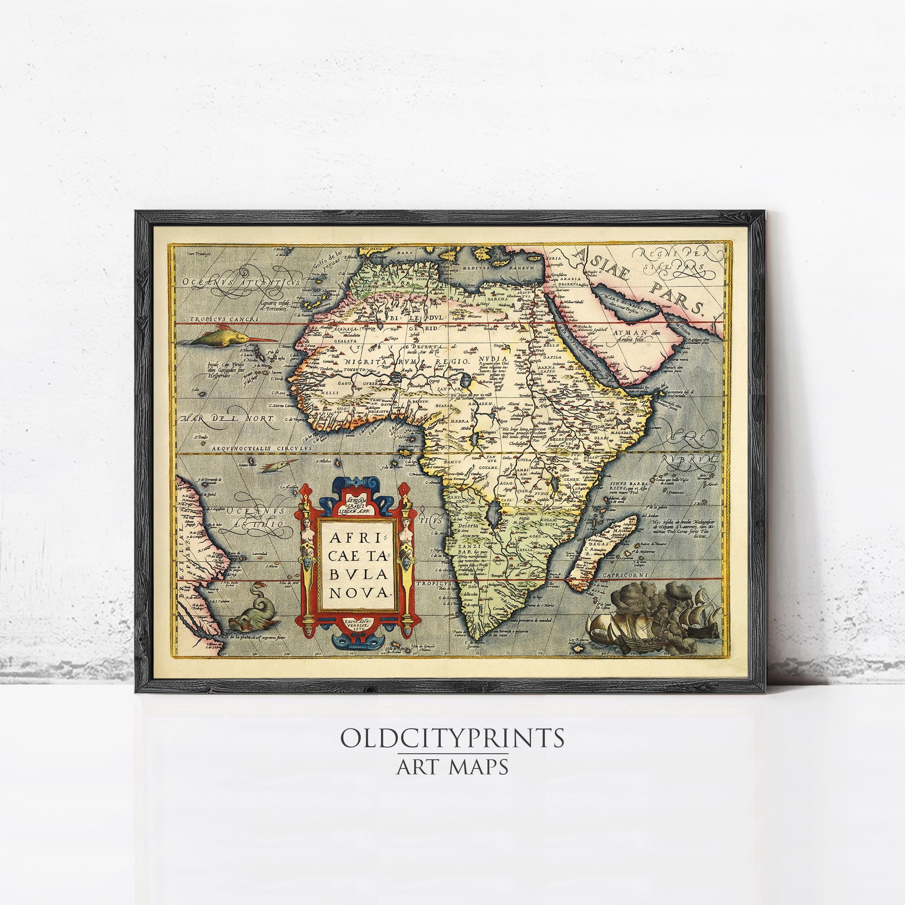 The image is a framed vintage map of Africa, depicting the continent and surrounding bodies of water.