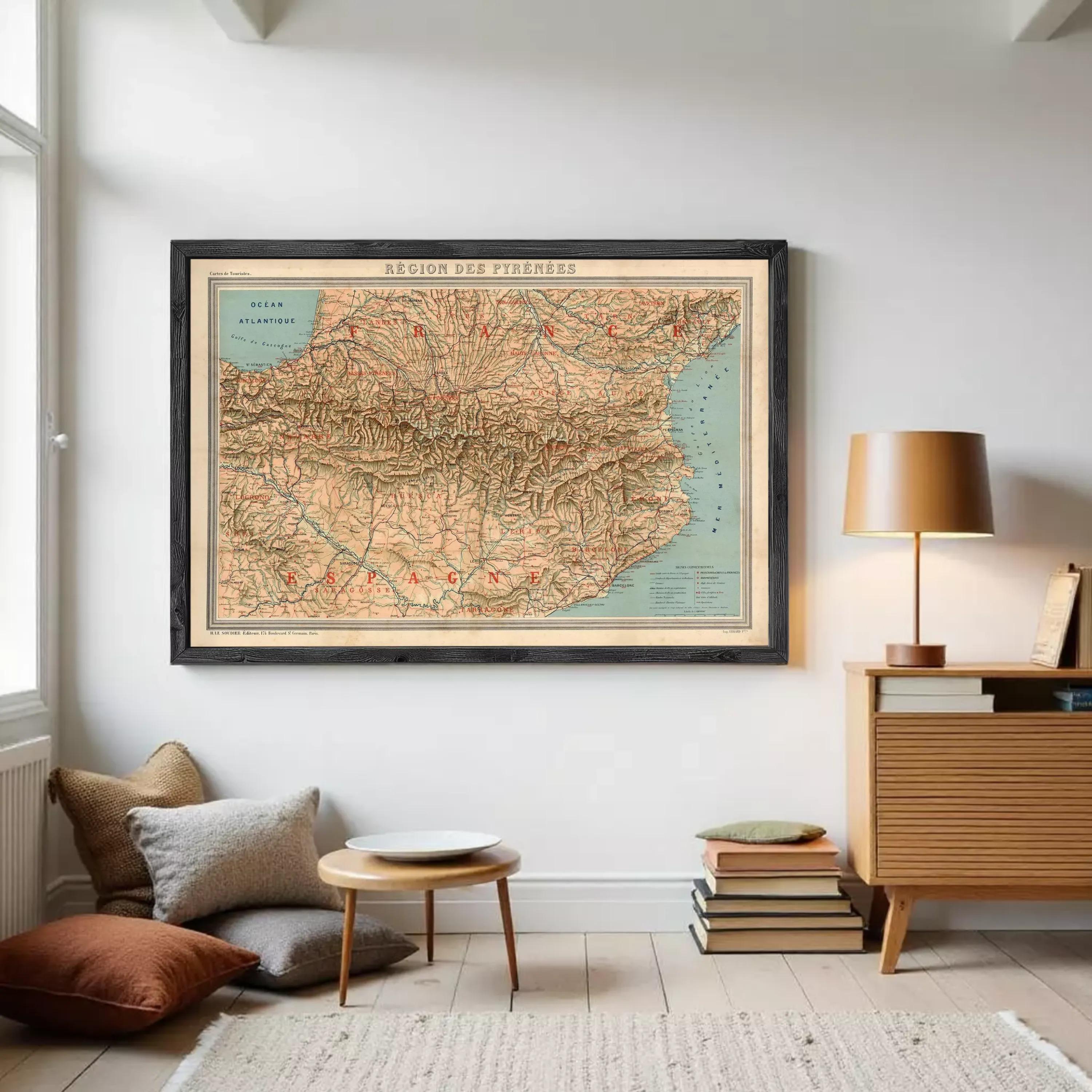 The image is a framed vintage map of the region of the Pyrenees, depicting the mountainous terrain and surrounding areas.