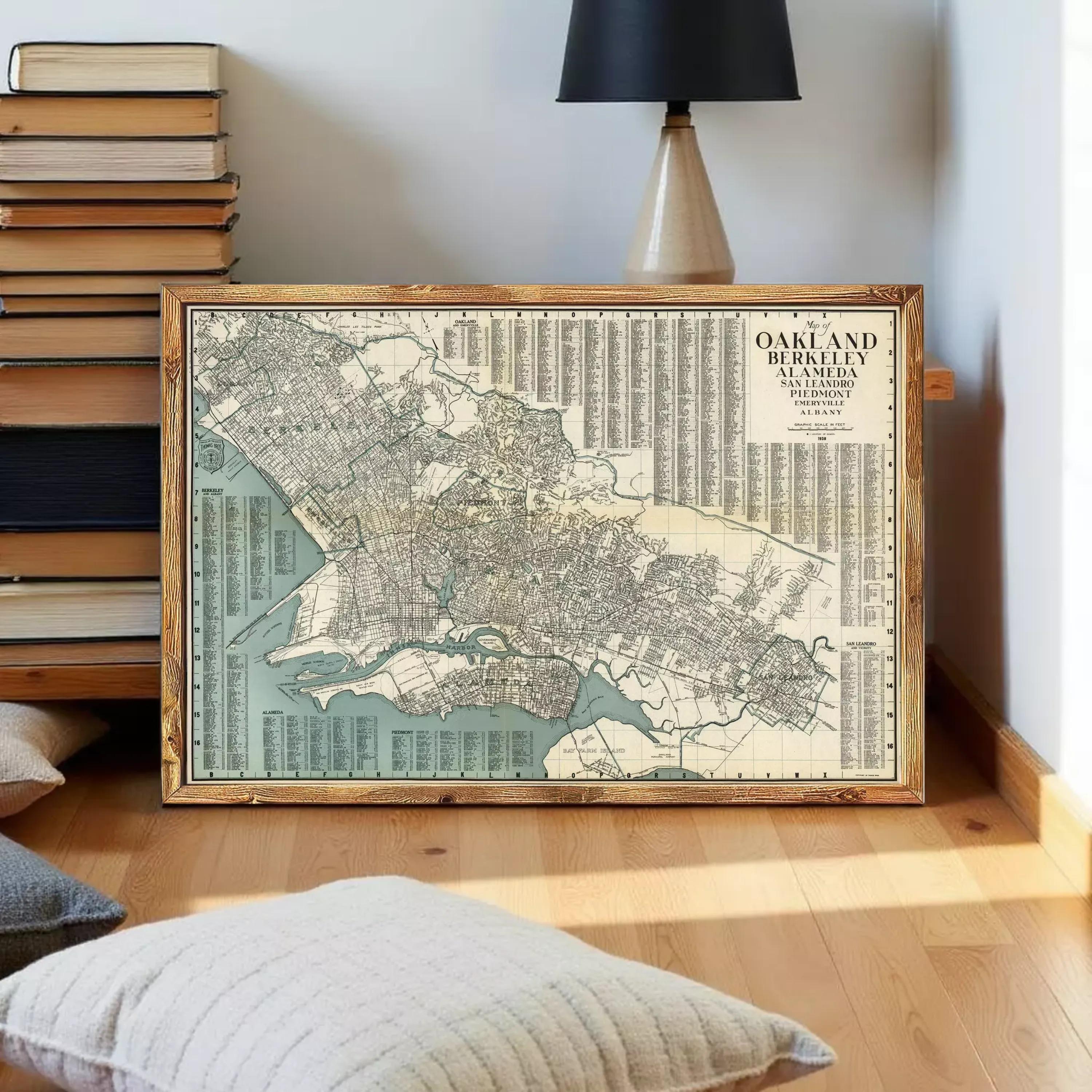 The image is a framed vintage map of Oakland, California, with a wooden frame.