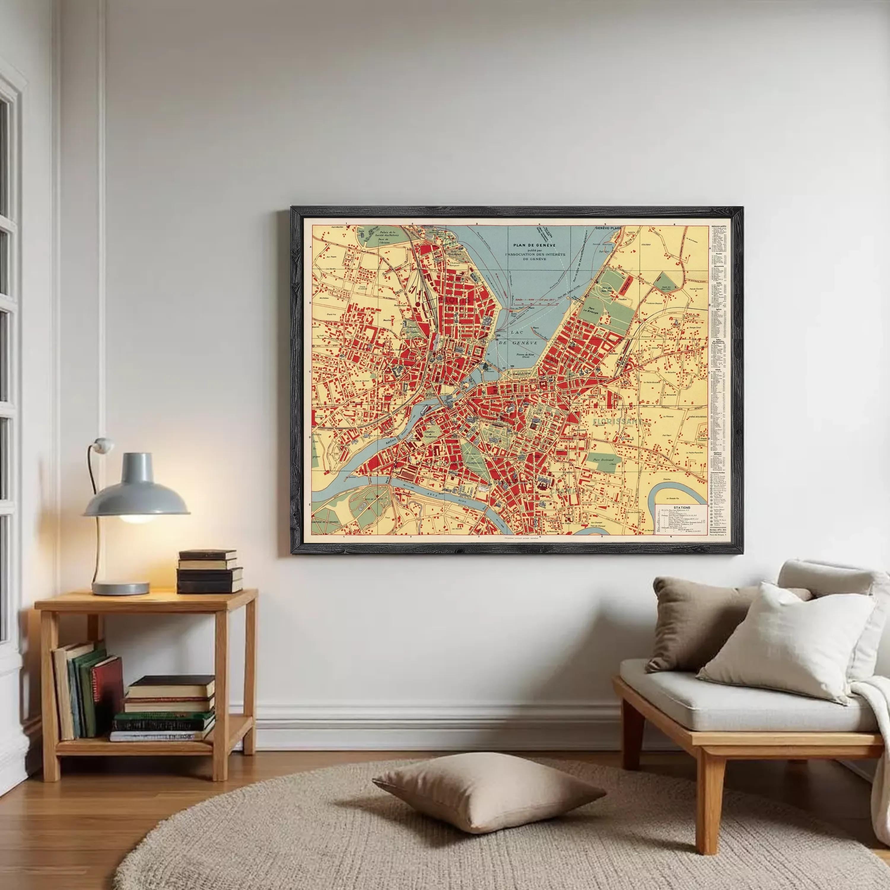 The image is a framed vintage map of a city, likely from the early 20th century, depicting the city's layout and surrounding areas.