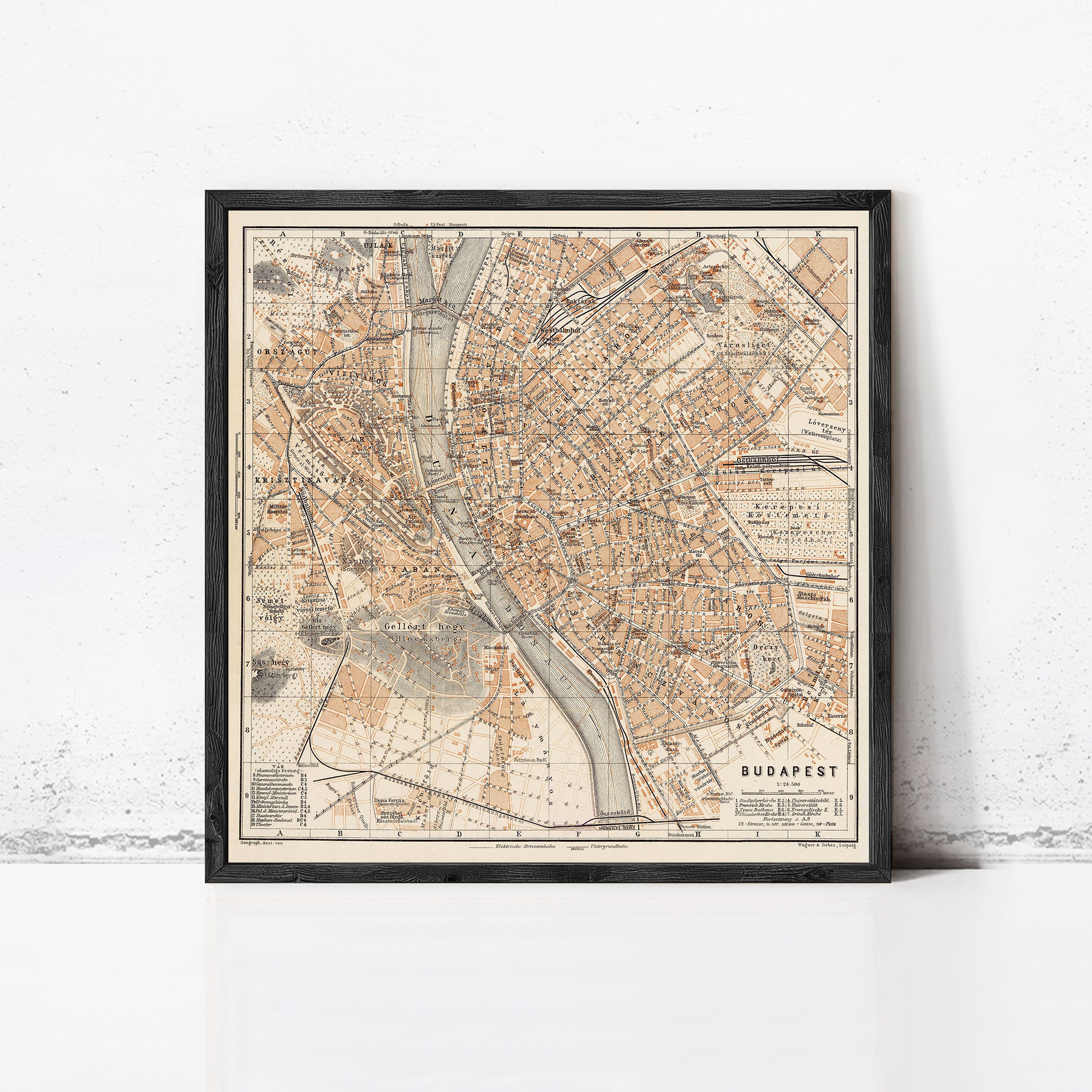 The image is a framed vintage map of Budapest, Hungary, depicting the city's streets and landmarks.