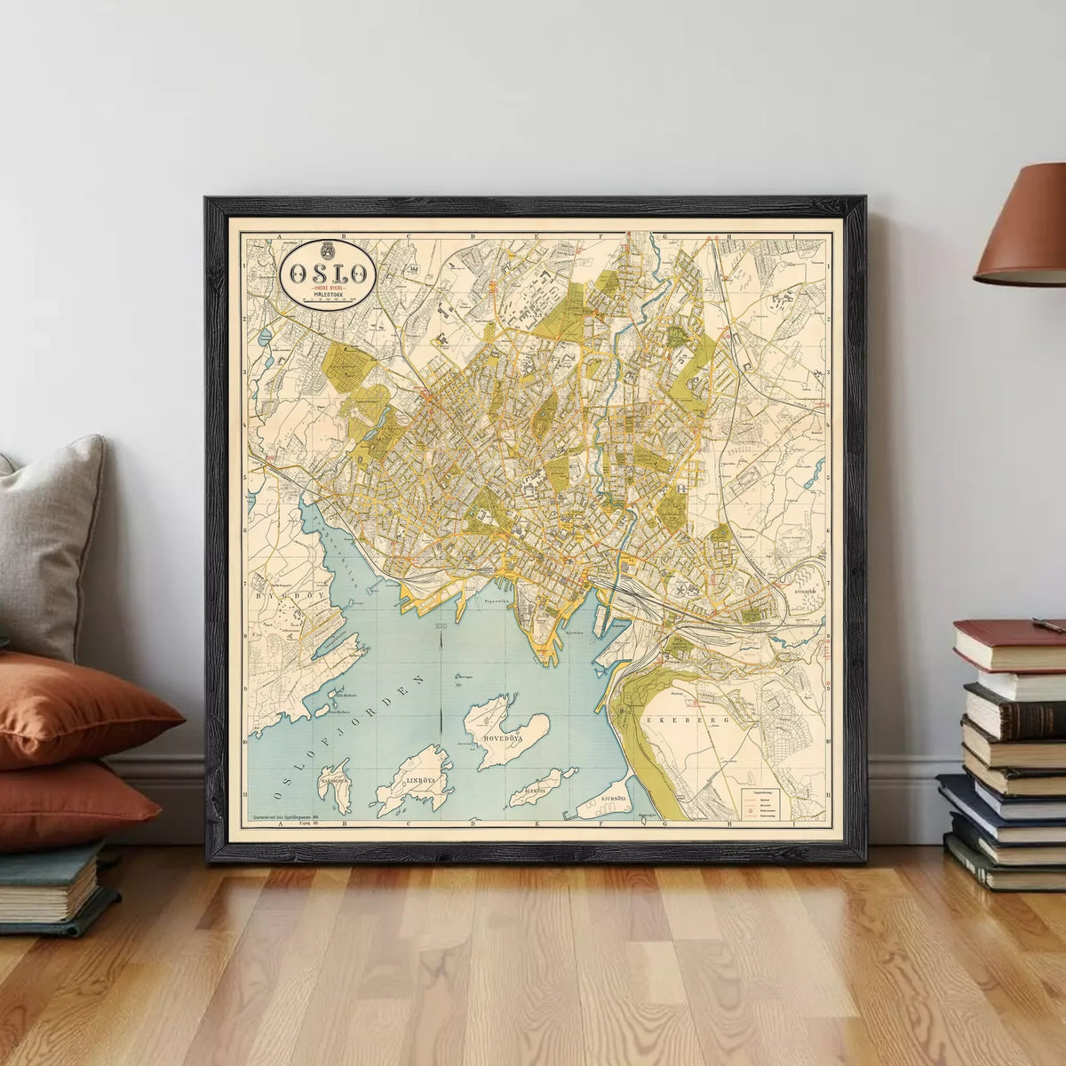 A framed map of the city of Oslo, Norway, displayed on a wall.