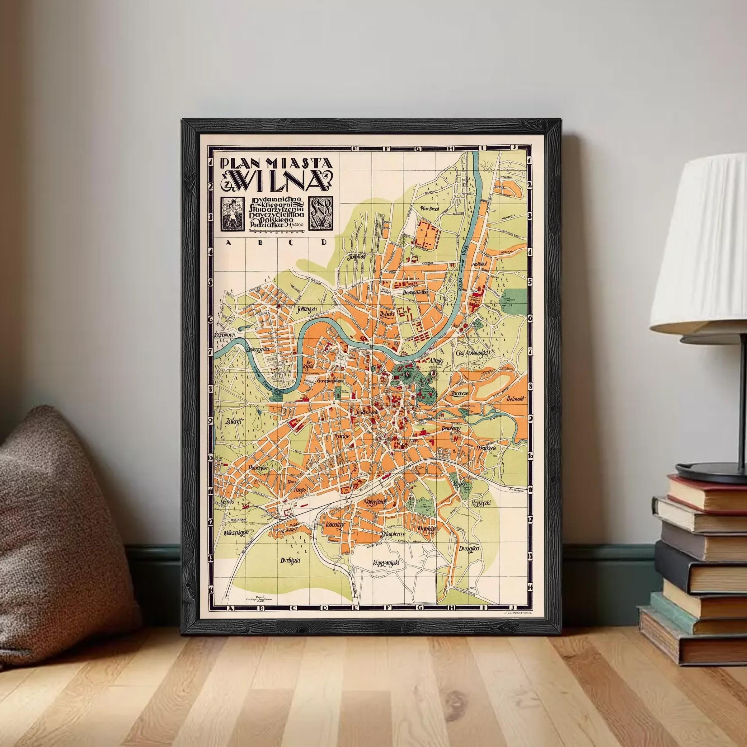 The image is a framed vintage map of Milan, Italy, depicting the city's layout and surrounding areas.