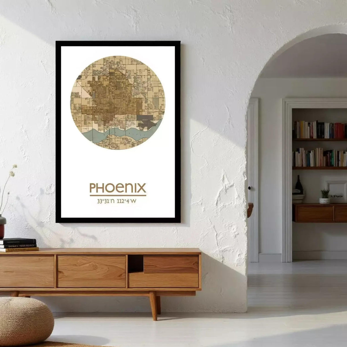 a framed map of Phoenix, Arizona, hanging on a wall in a room with a wooden cabinet below it.