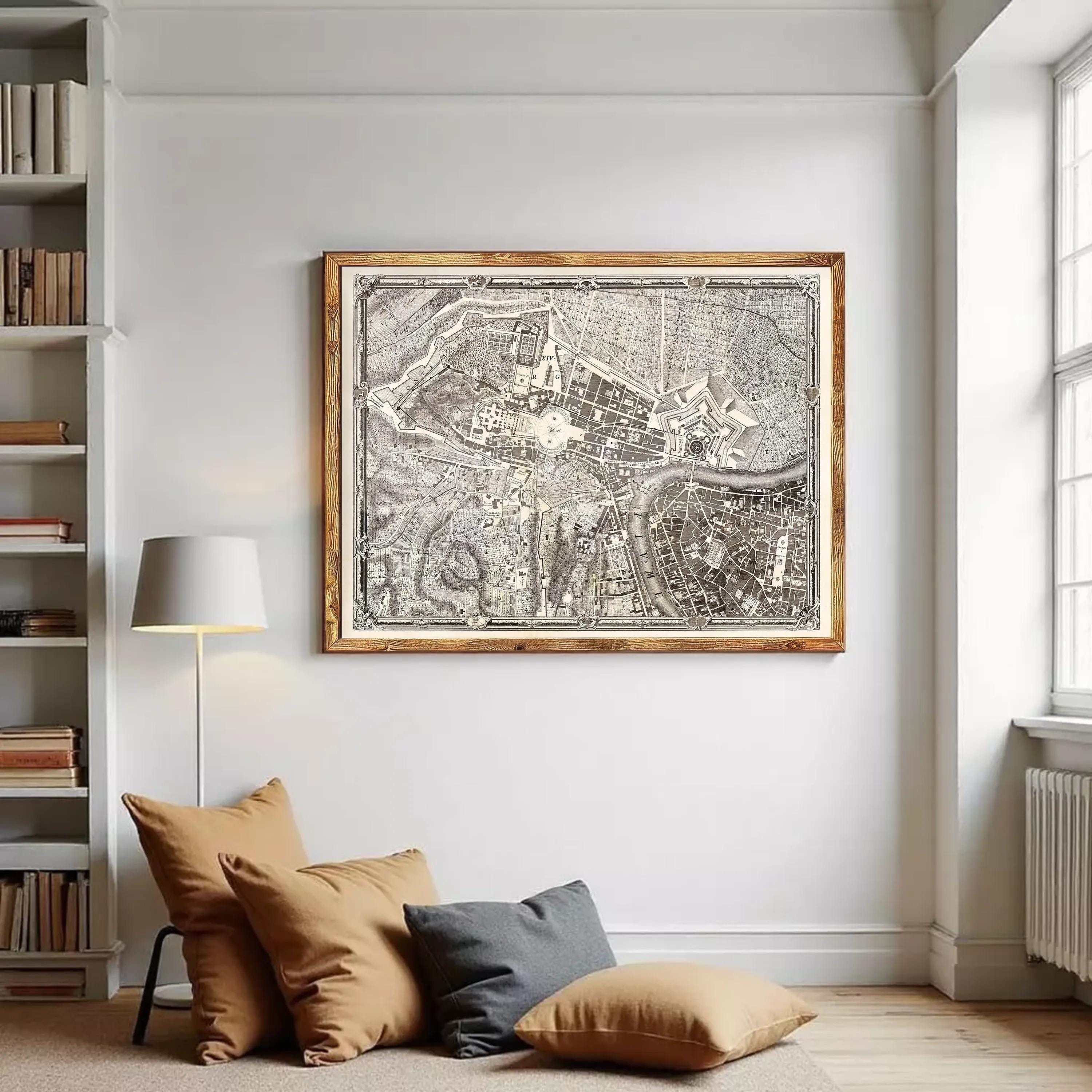 The image is a framed antique map of a city, likely from the 18th century, displayed on a white wall.