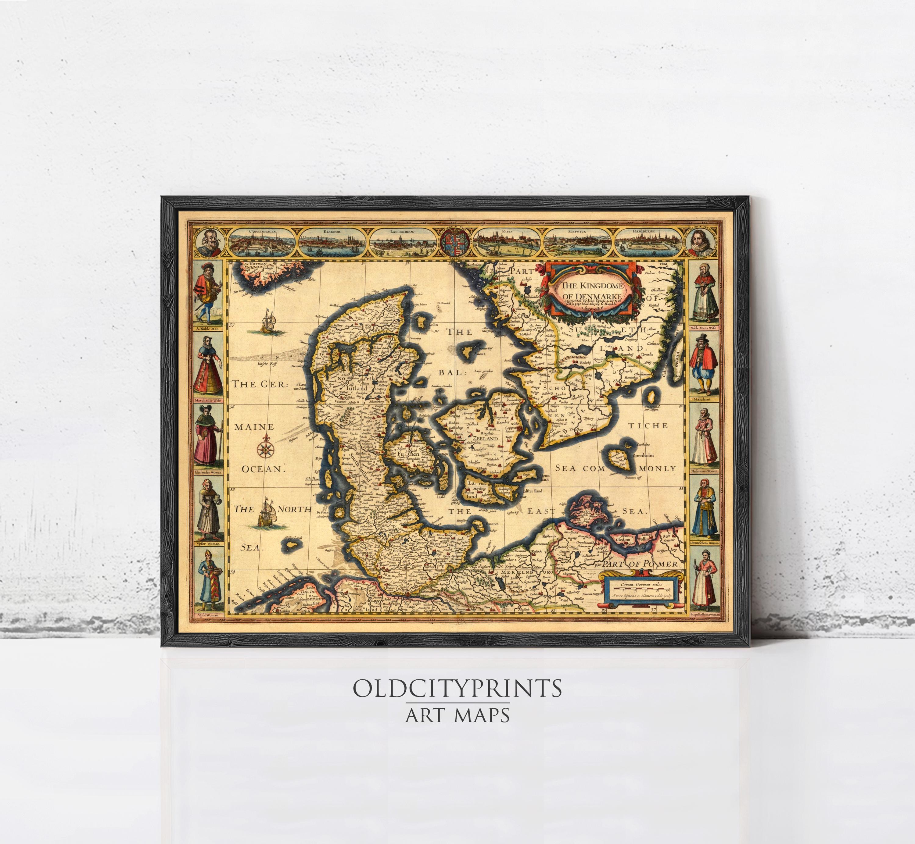 The image is a framed antique map of Europe, featuring detailed illustrations and labels.