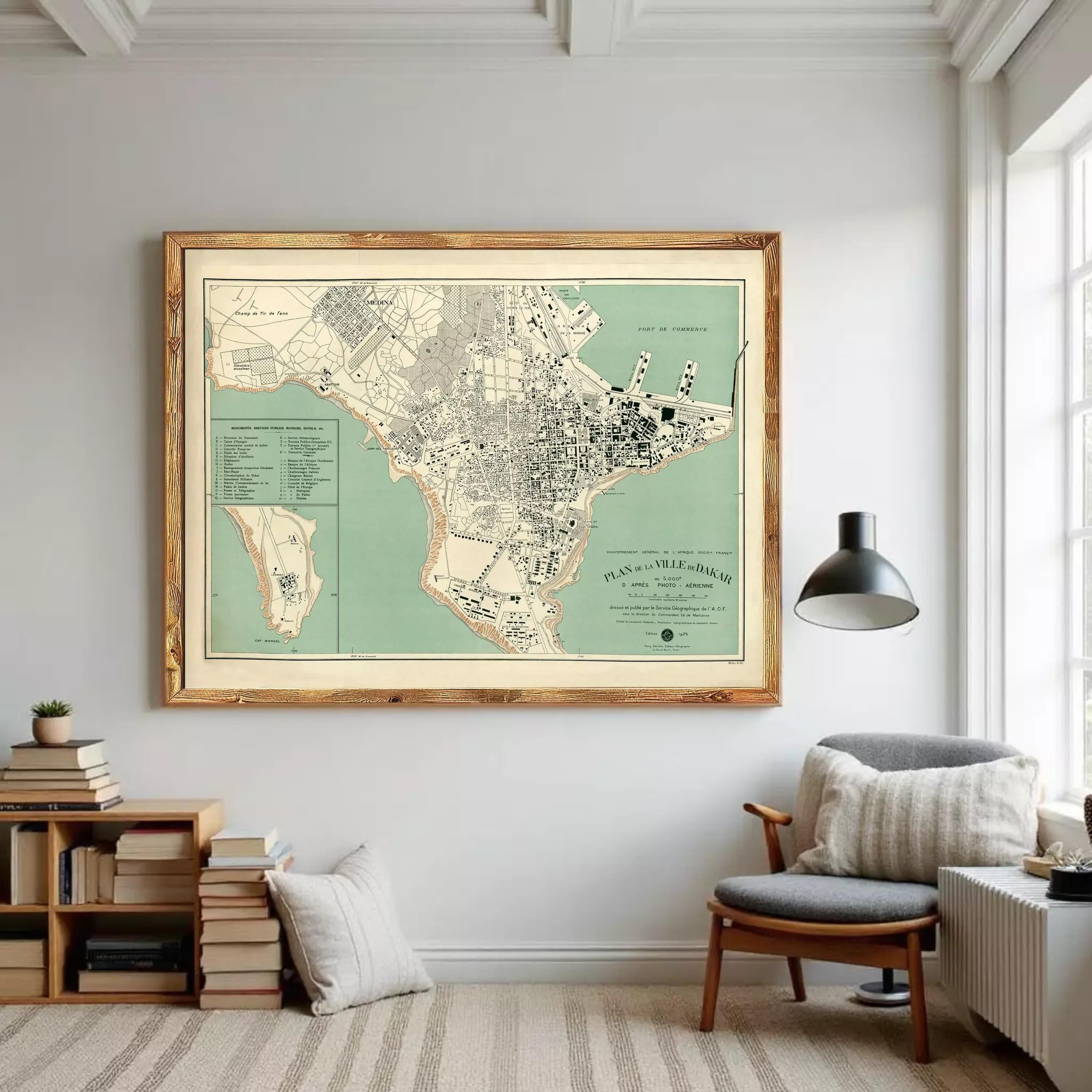 The image is a framed vintage map of a city, depicting a detailed layout of the streets, landmarks, and surrounding areas.