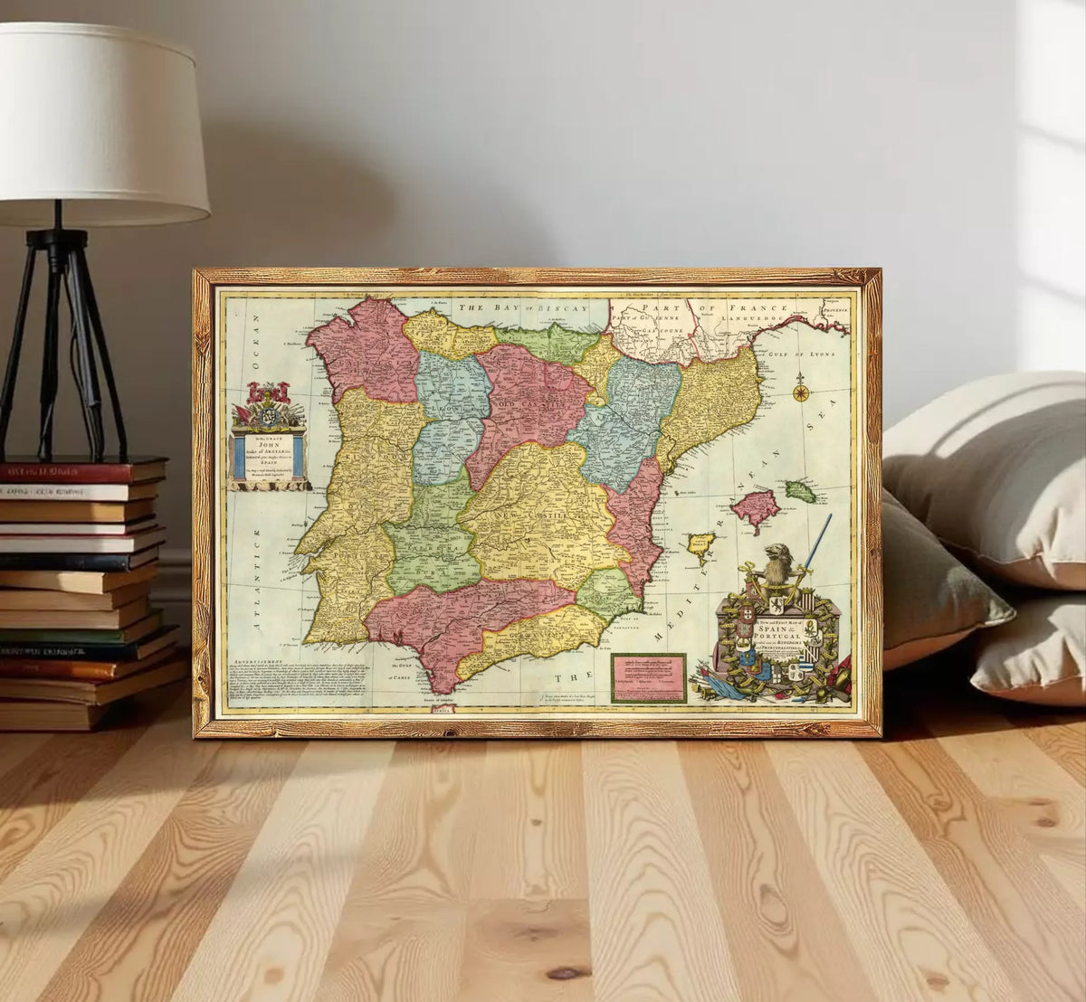 The image is a framed vintage map of Spain, featuring colorful regions and labels.