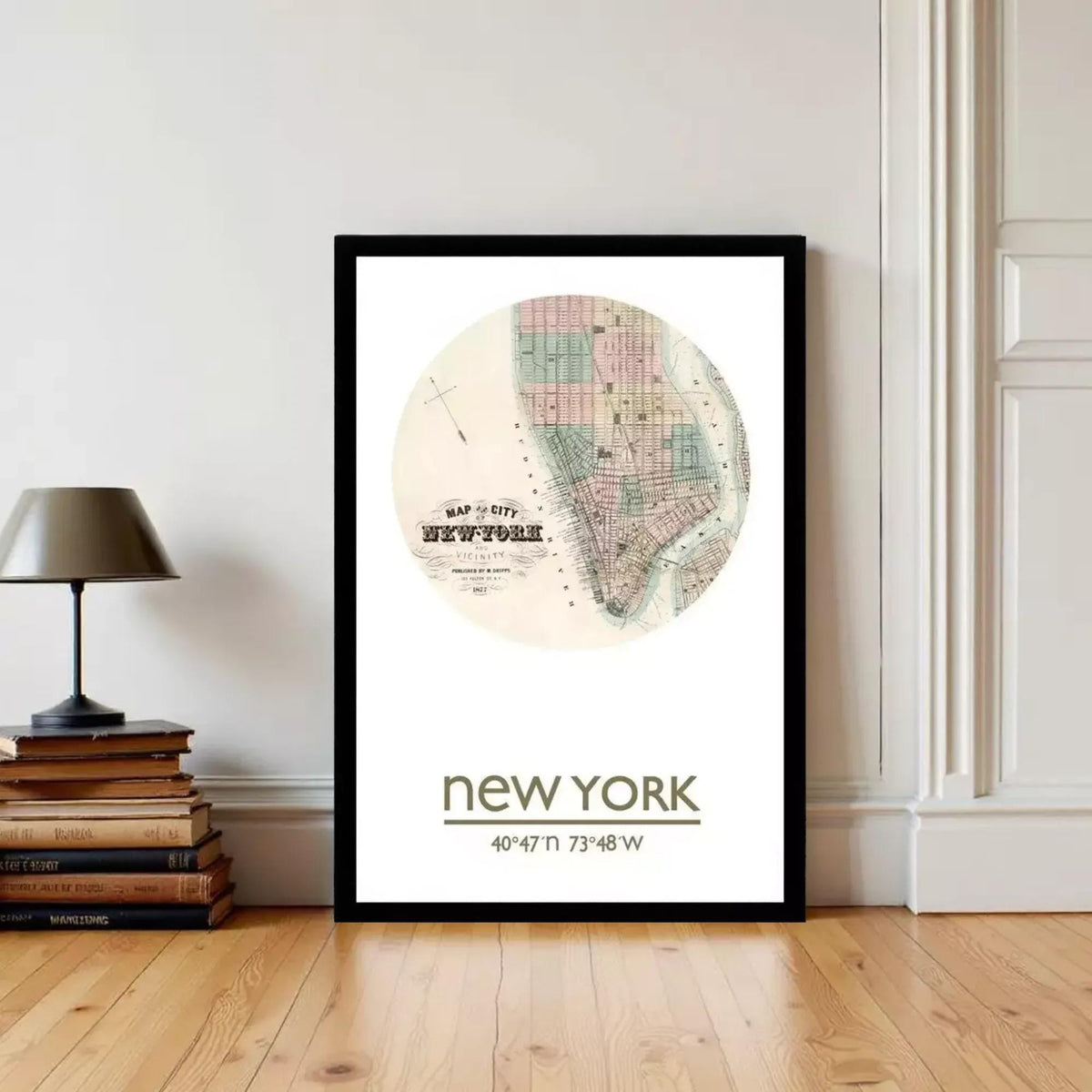 A framed vintage map of New York City, with the text "Map of NYC New York" and "40.47° N 73.48° W" printed on it.
