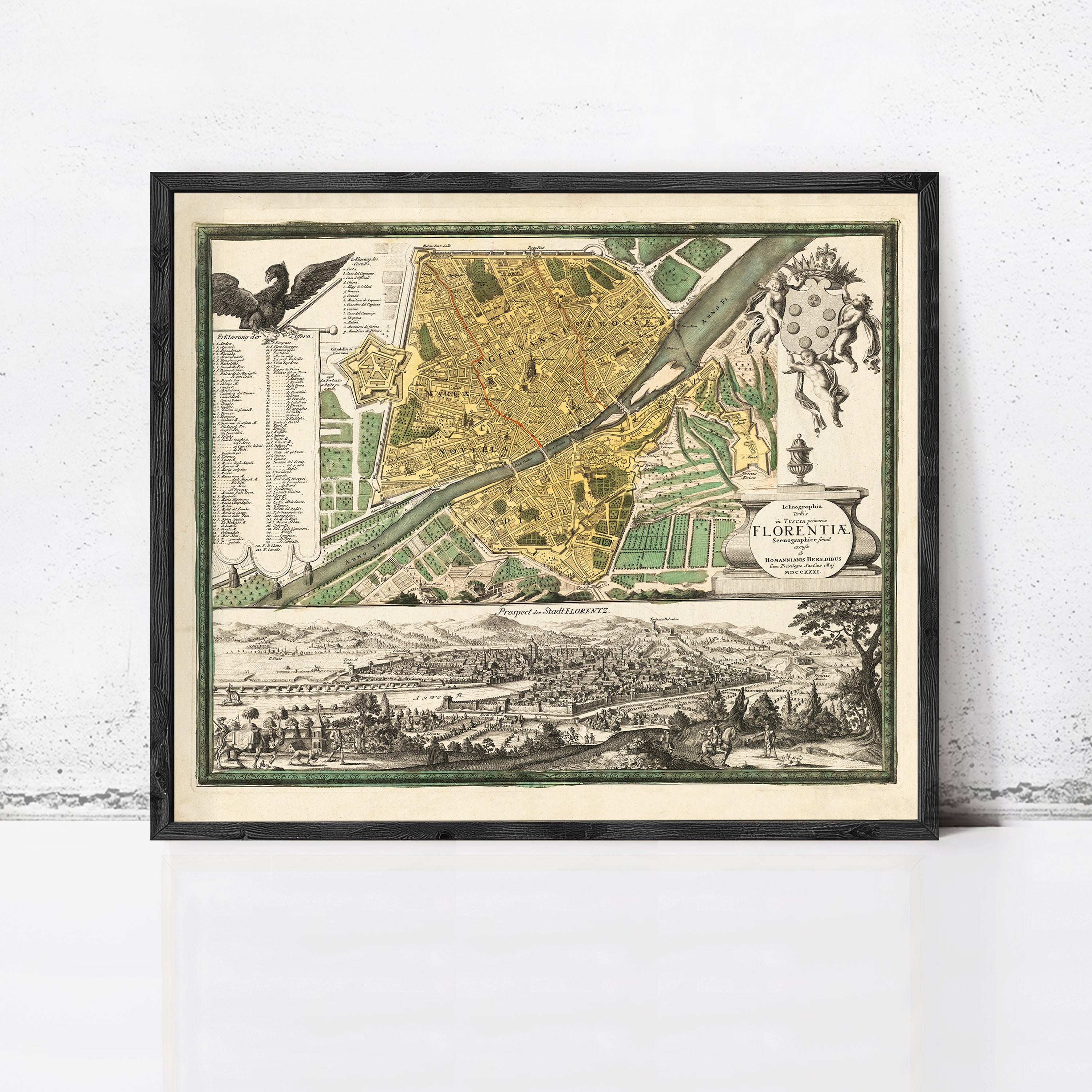 The image is a framed antique map of Florence, Italy, depicting the city and surrounding areas in a detailed and intricate manner.