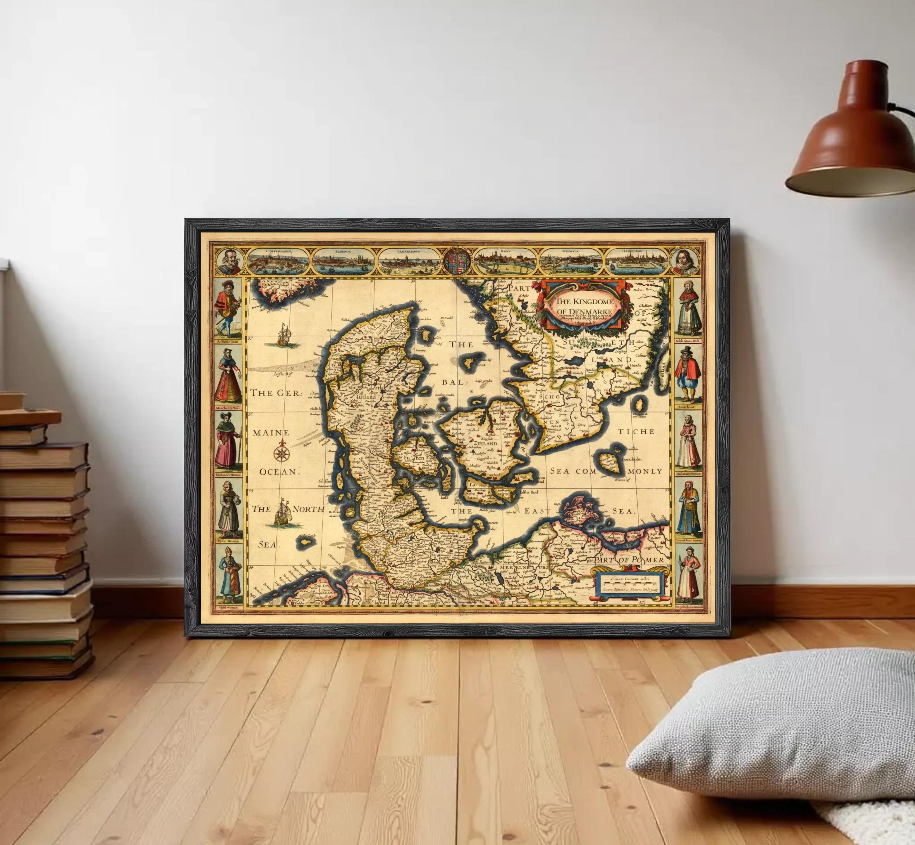 The image is a framed antique map of Europe, featuring detailed illustrations and labels.