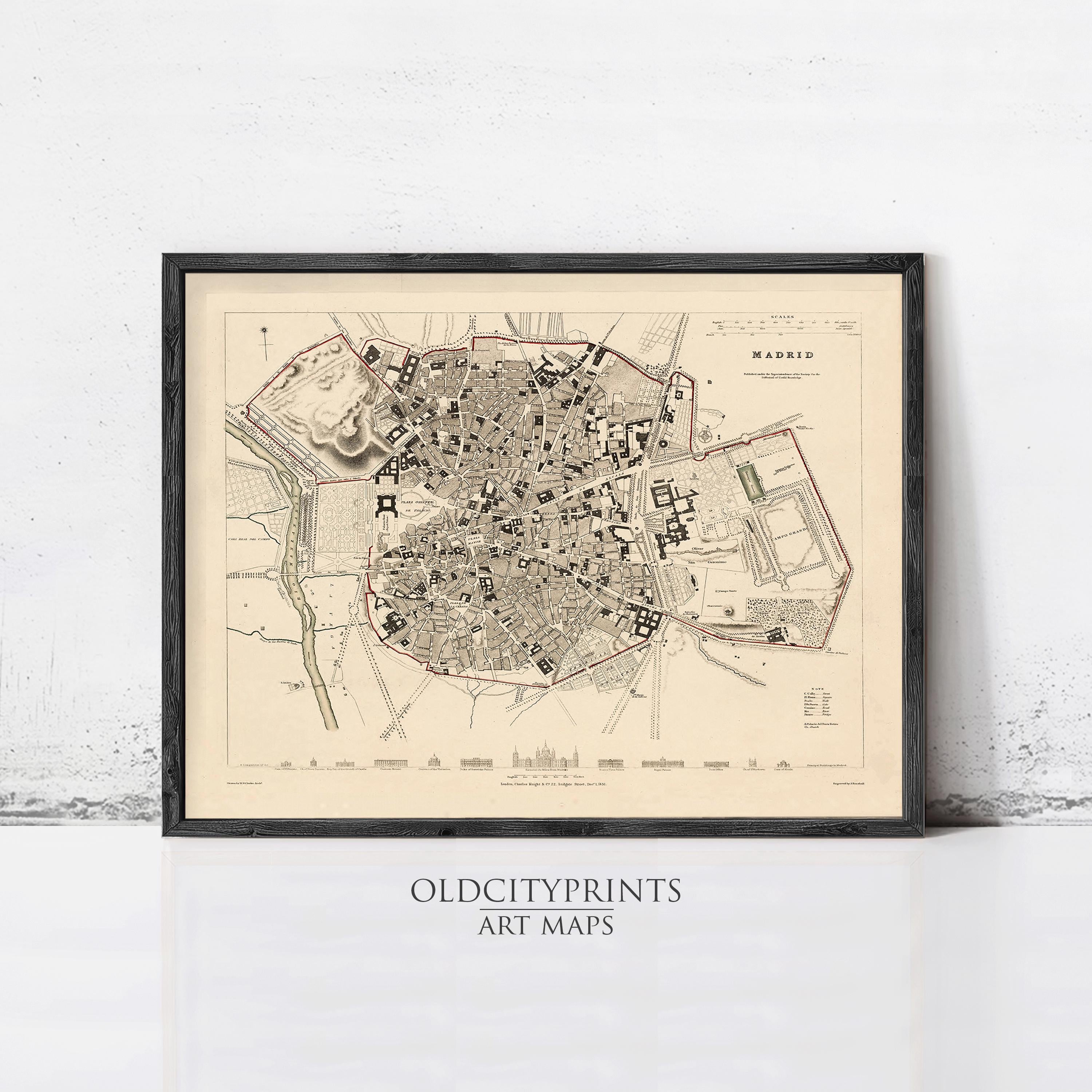 The image is a framed vintage map of Madrid, Spain, depicting the city's layout and surrounding areas.