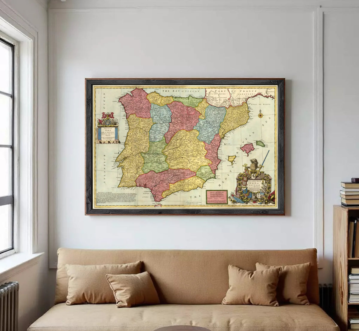 The image is a framed vintage map of Spain, featuring colorful regions and a coat of arms.