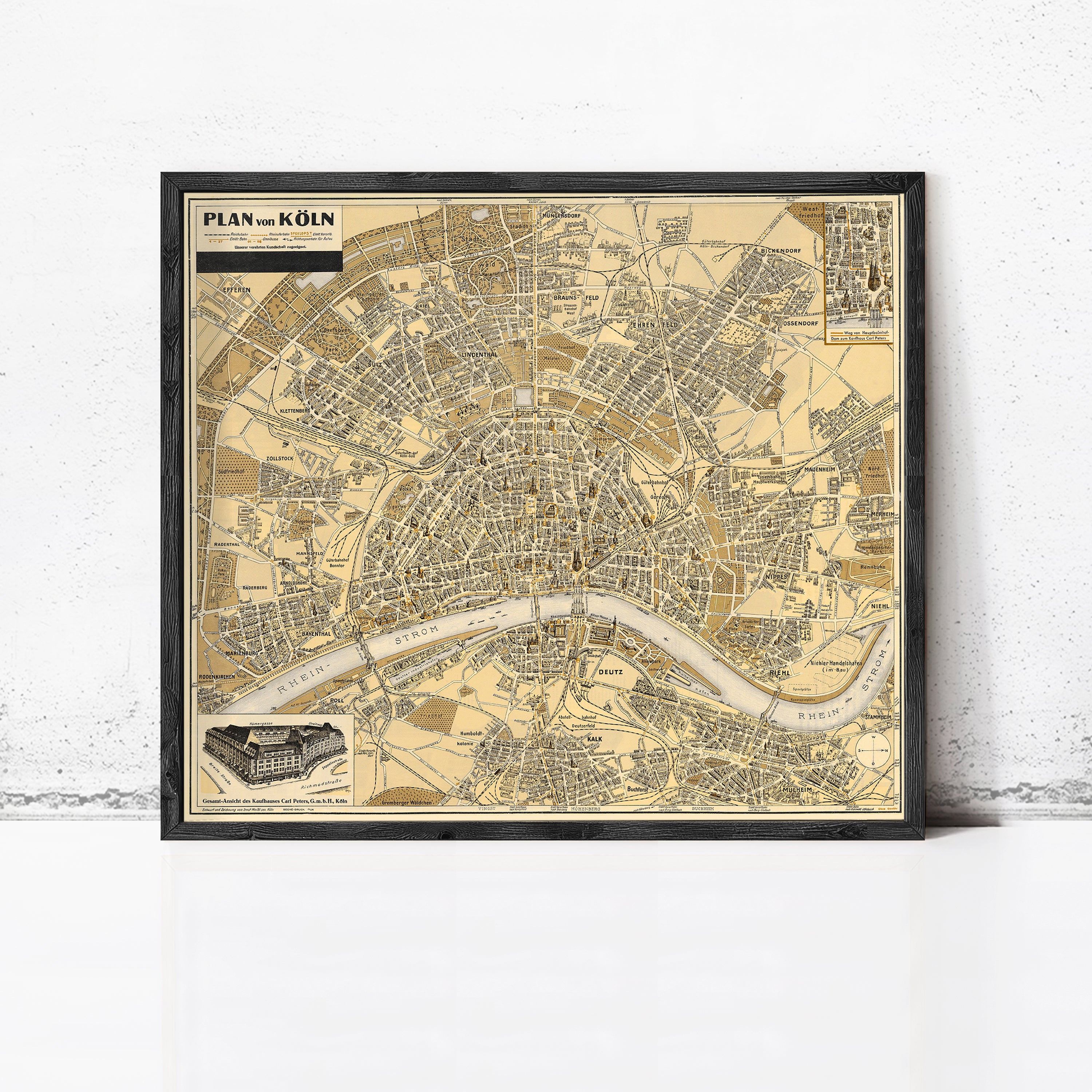The image is a framed vintage map of the city of König, Germany, depicting the city's streets, landmarks, and surrounding areas.