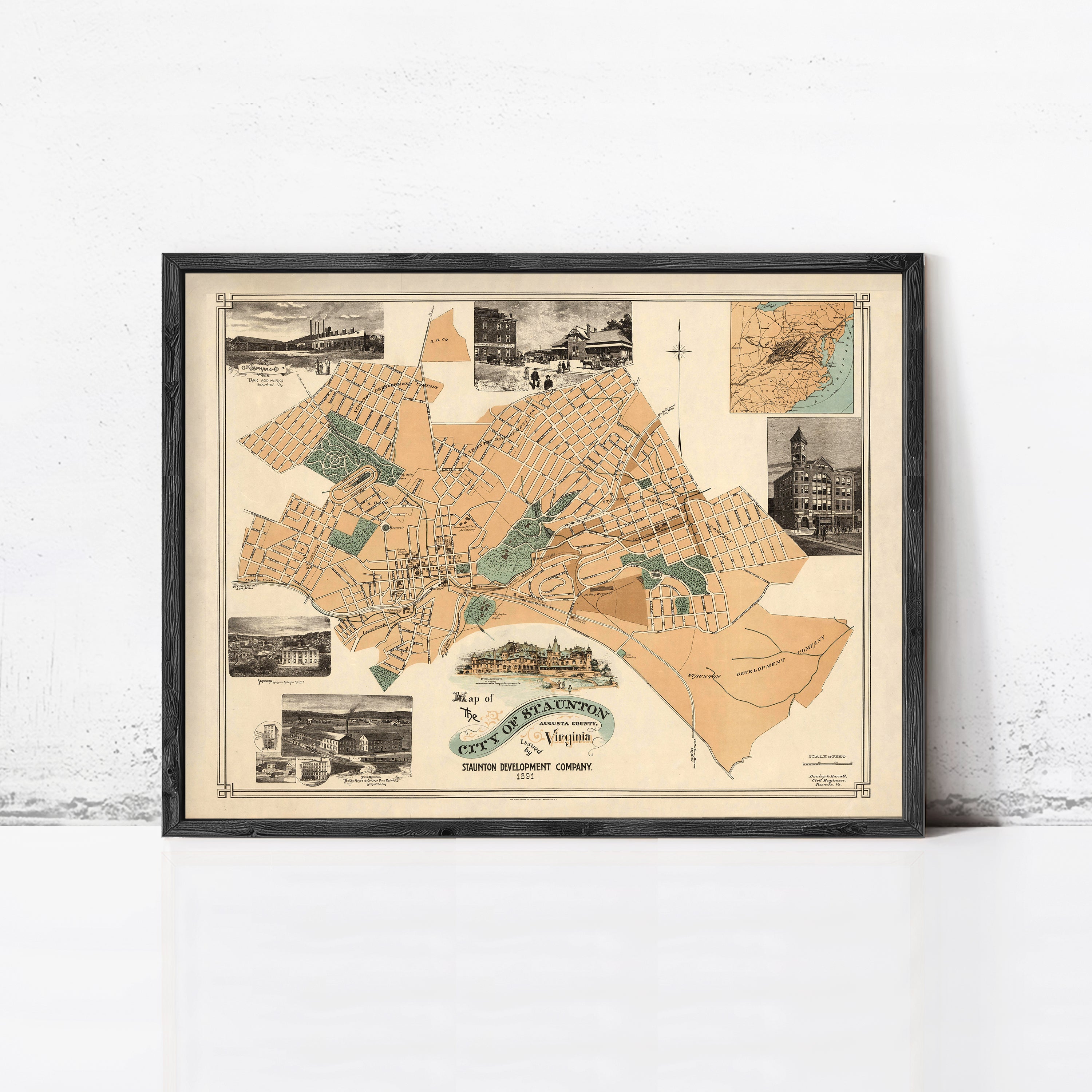 The image is a framed vintage map of the city of Philadelphia, Pennsylvania, depicting various landmarks and streets.
