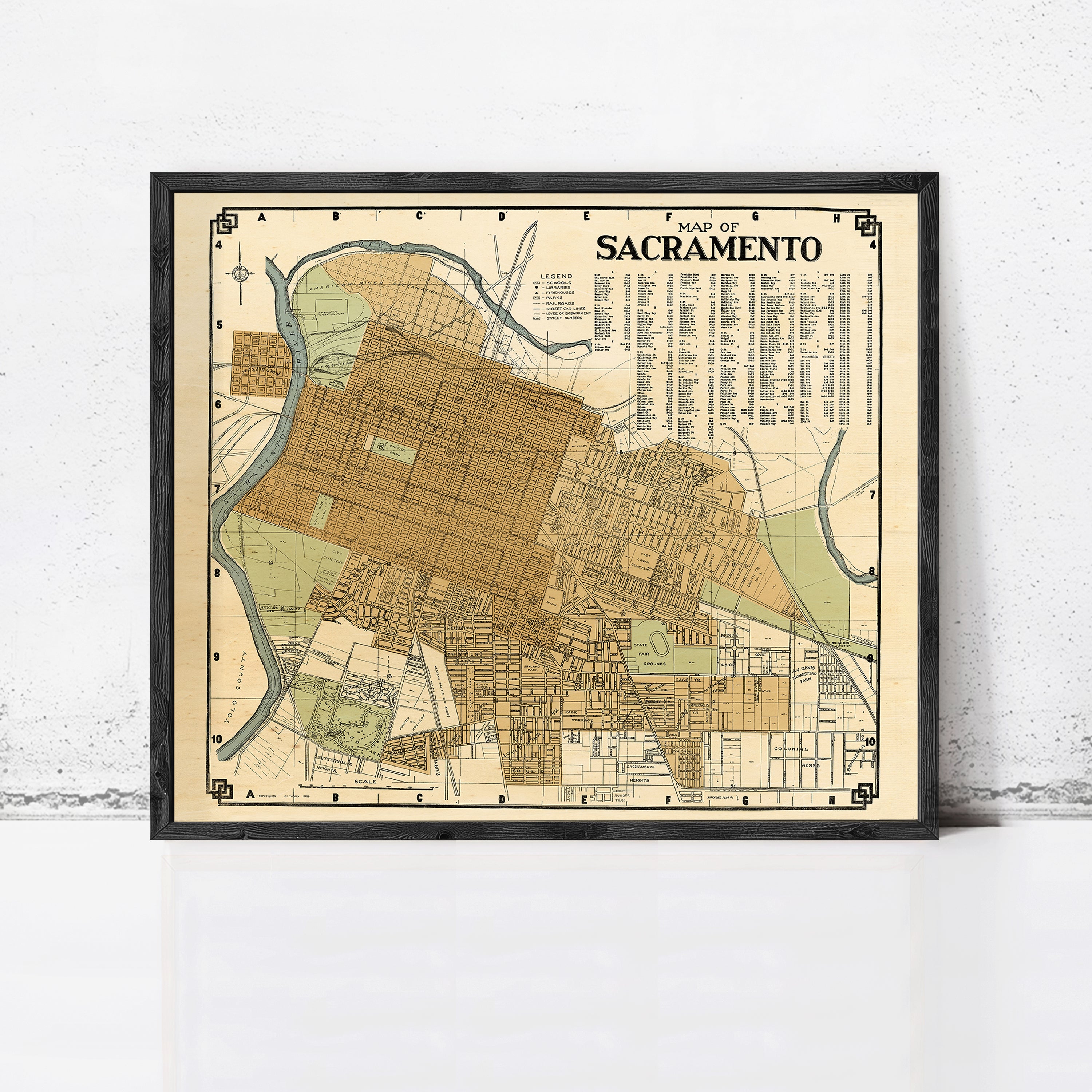 The image is a framed vintage map of Sacramento, California.
