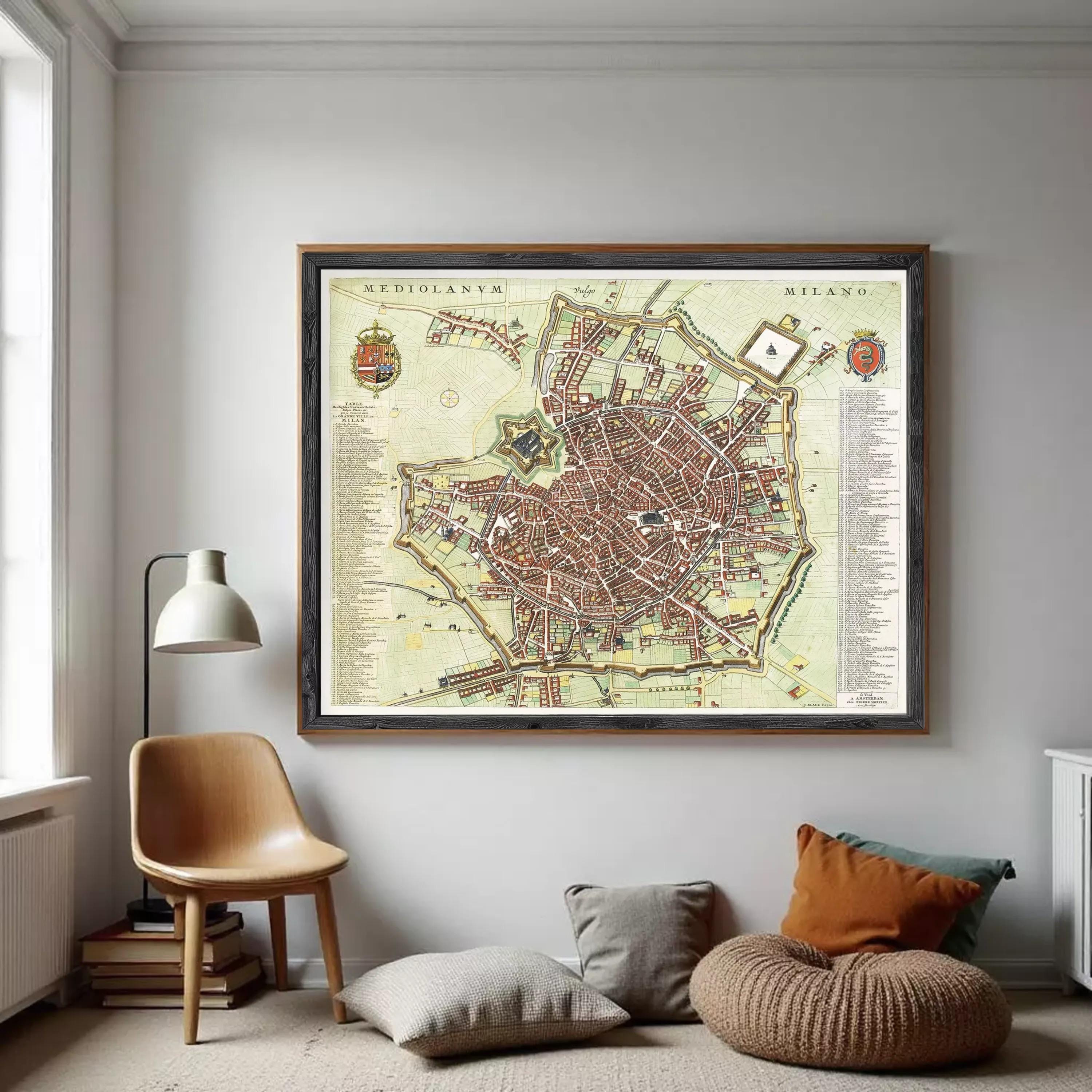 The image is a framed map of Milan, Italy, depicting the city's streets and landmarks.