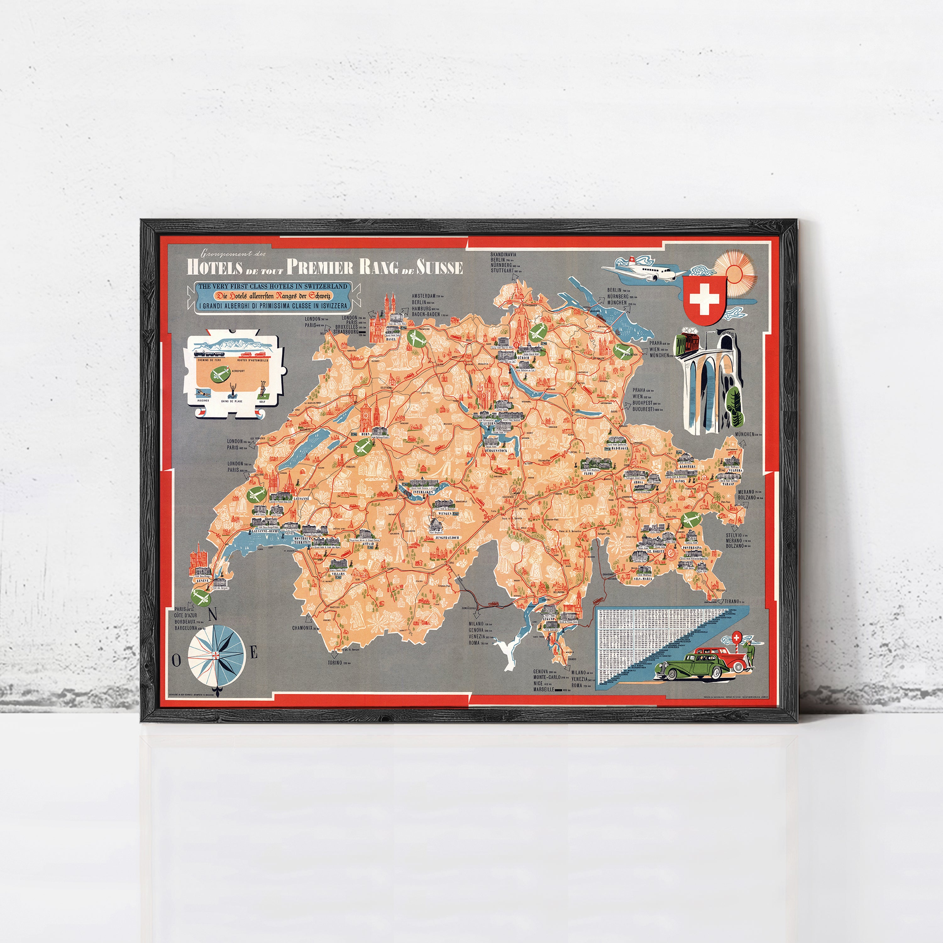 The image is a framed map of Switzerland, featuring various landmarks and locations throughout the country.