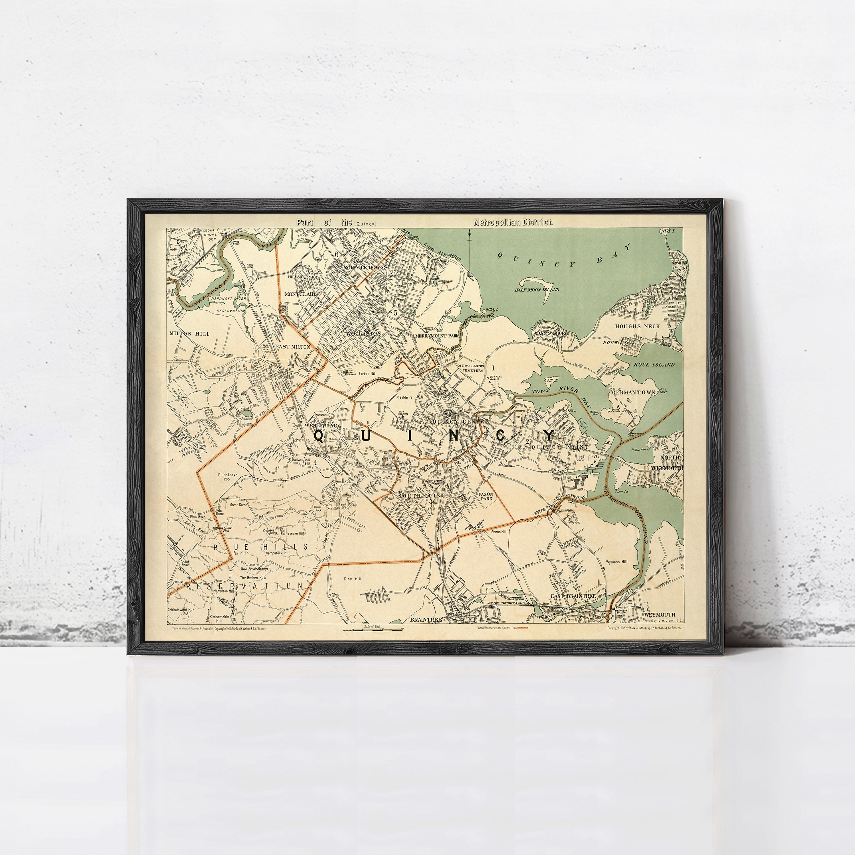 The image is a framed vintage map of the city of QuINCY, showing the layout of the city and surrounding areas.